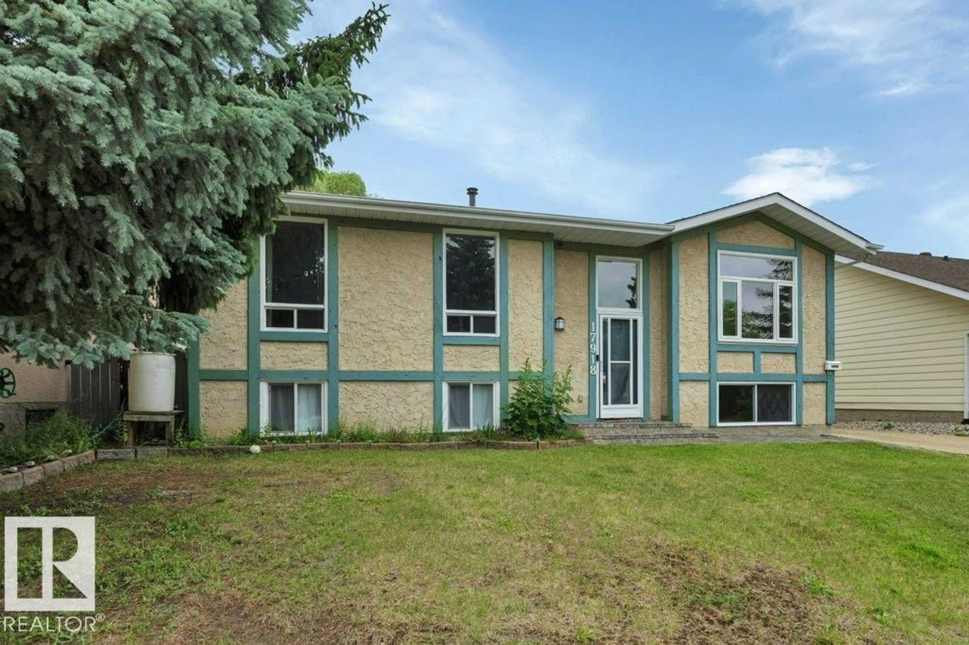Home with vinyl exterior material, street for 17918 63A AV, Edmonton Alberta T5T2J2