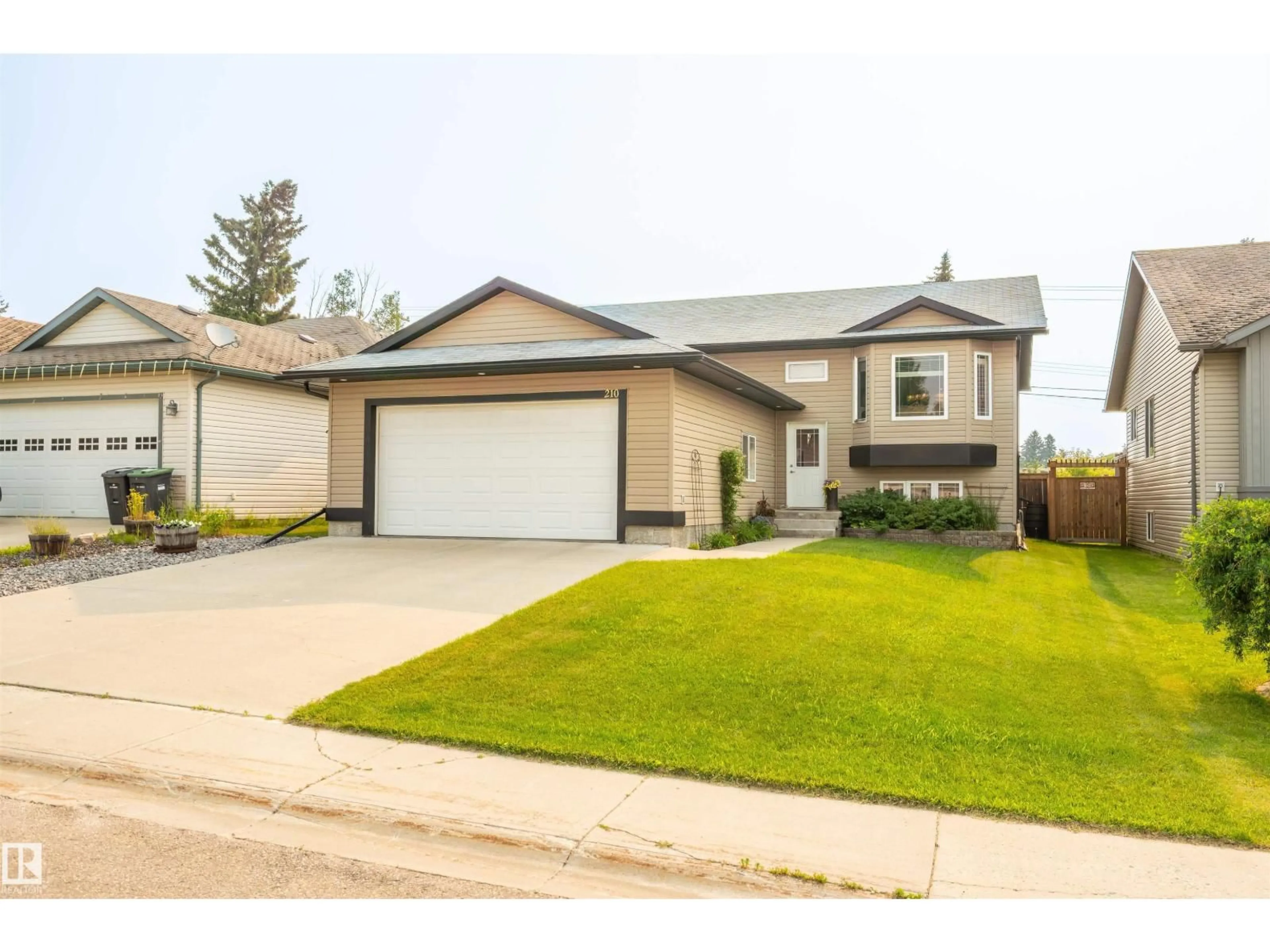 Home with vinyl exterior material, street for 210 23 ST, Cold Lake Alberta T9M0A8