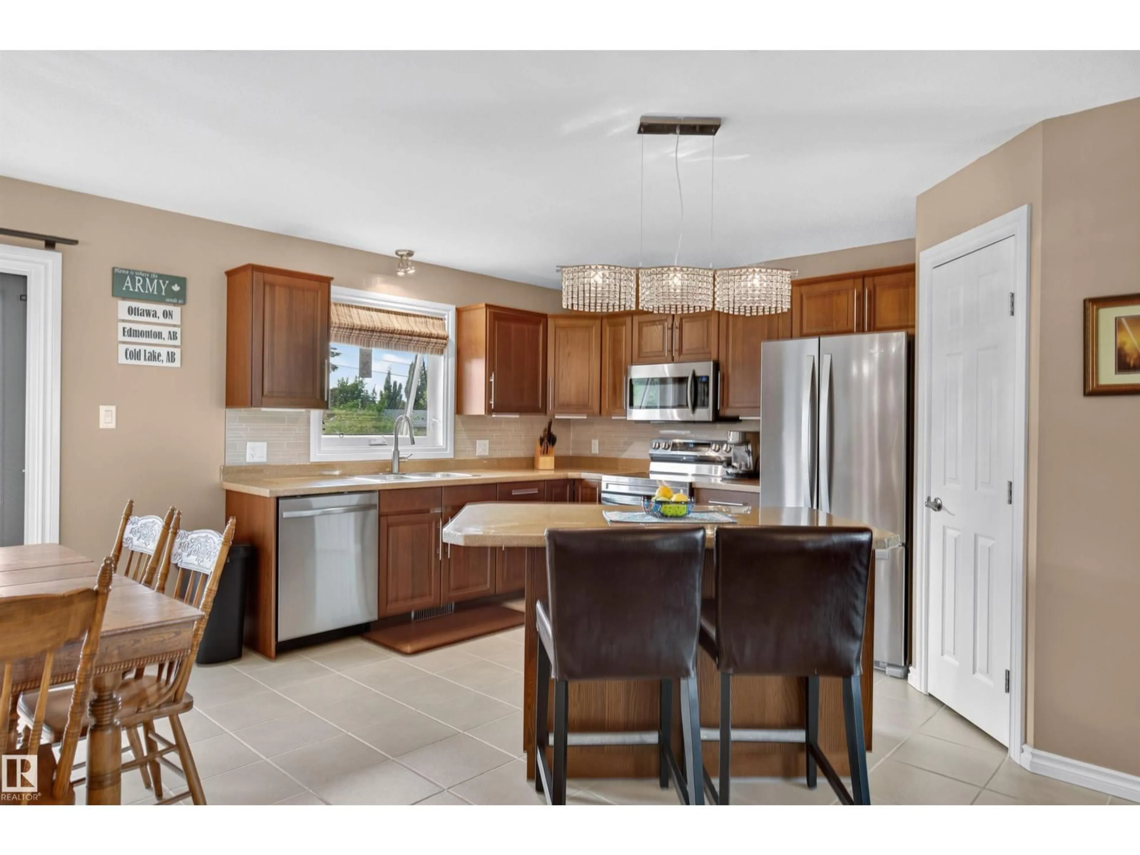 Open concept kitchen, ceramic/tile floor for 210 23 ST, Cold Lake Alberta T9M0A8