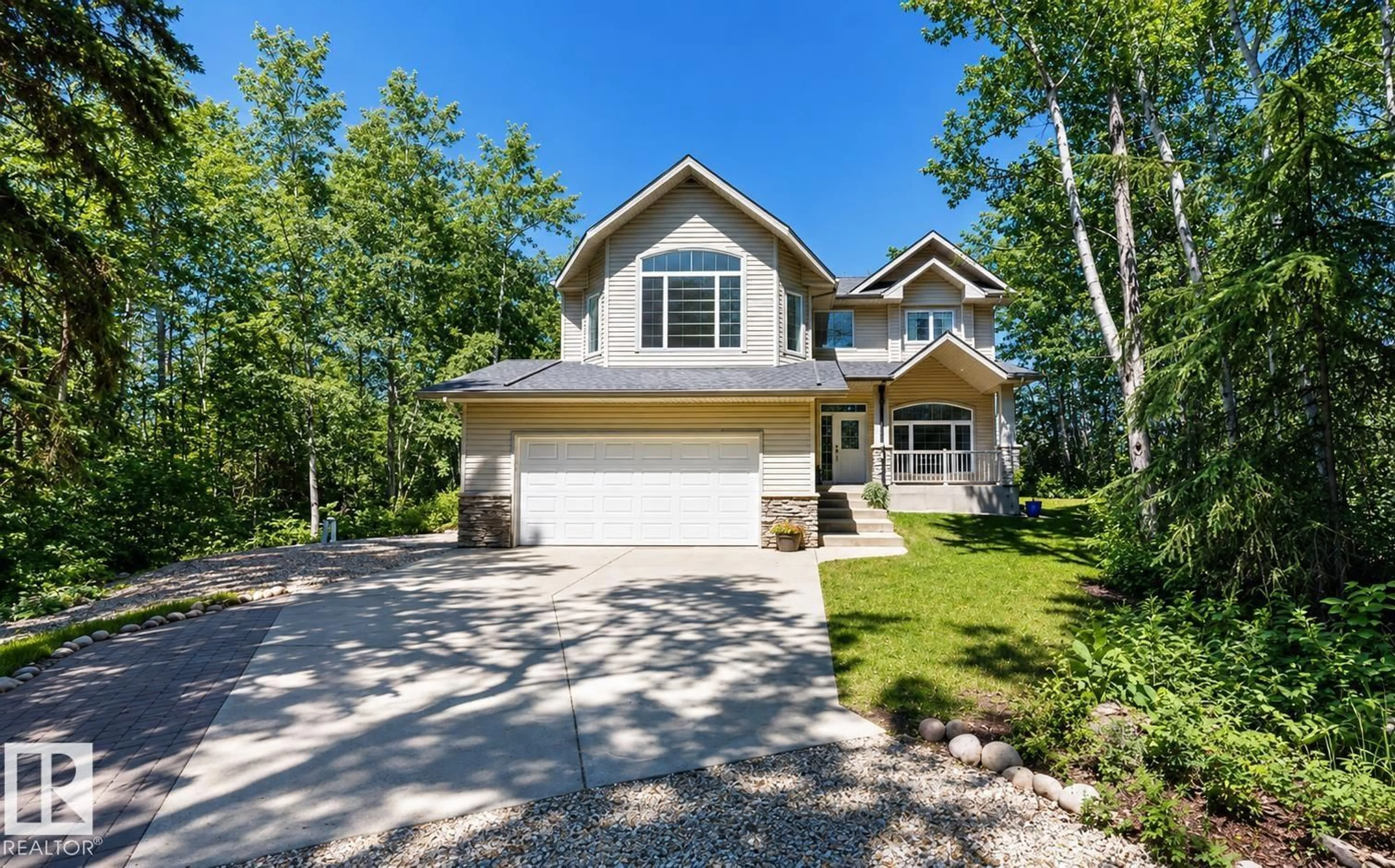 Home with vinyl exterior material, street for 13 27107 TWP ROAD 510, Rural Parkland County Alberta T7Y1H6