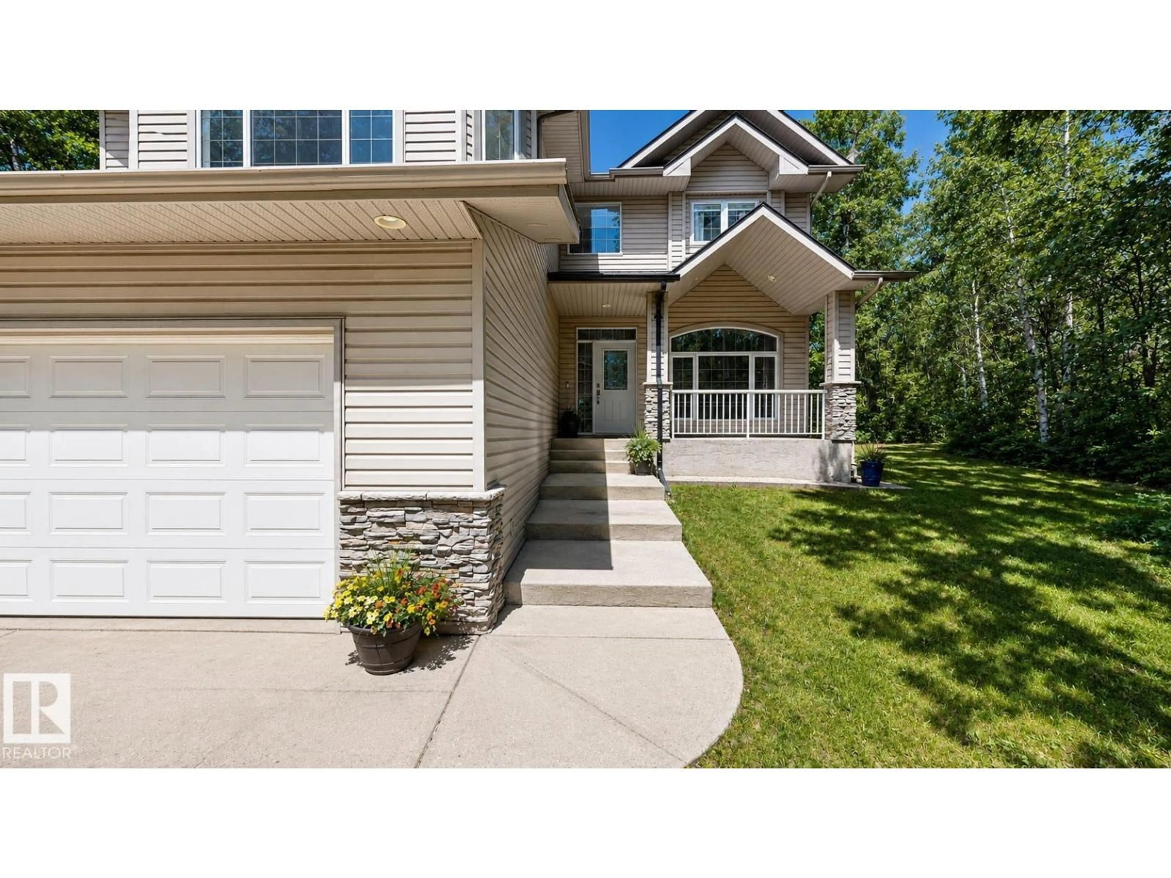 Home with vinyl exterior material, street for 13 27107 TWP ROAD 510, Rural Parkland County Alberta T7Y1H6