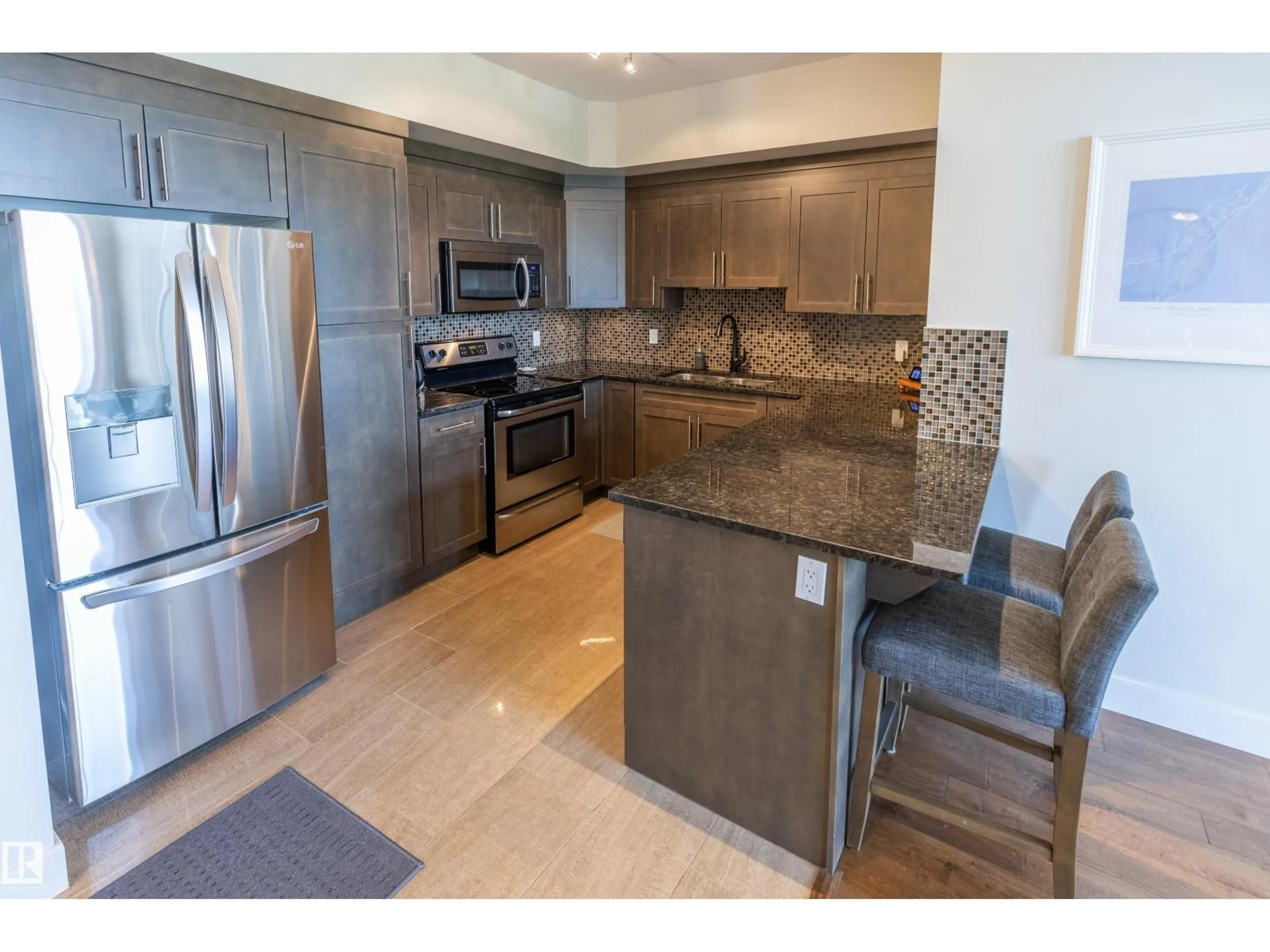 Open concept kitchen, ceramic/tile floor for #307 - 279 WYE RD, Sherwood Park Alberta T8B0A4