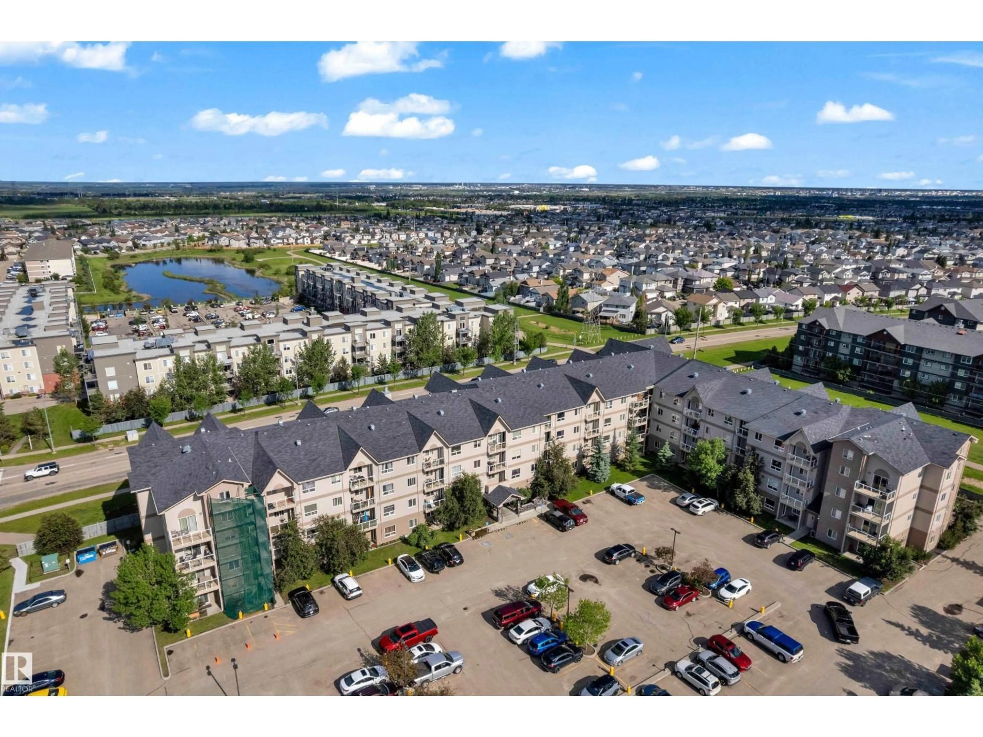 A pic from outside/outdoor area/front of a property/back of a property/a pic from drone, unknown for #125 - 5005 165 AV, Edmonton Alberta T5Y0L8