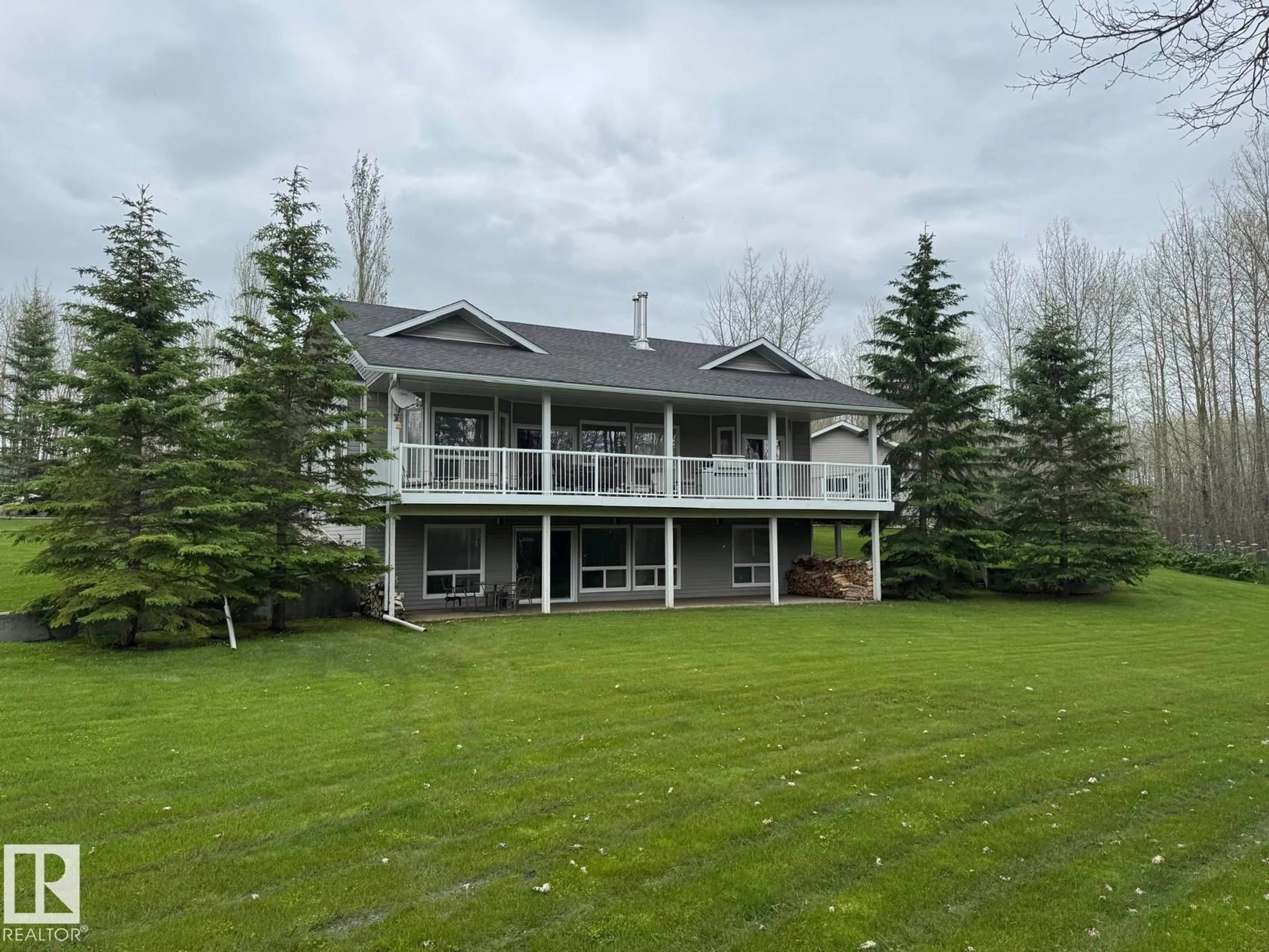 A pic from outside/outdoor area/front of a property/back of a property/a pic from drone, unknown for 465022 - 74 RANGE ROAD 61, Rural Wetaskiwin County Alberta T0C0T0
