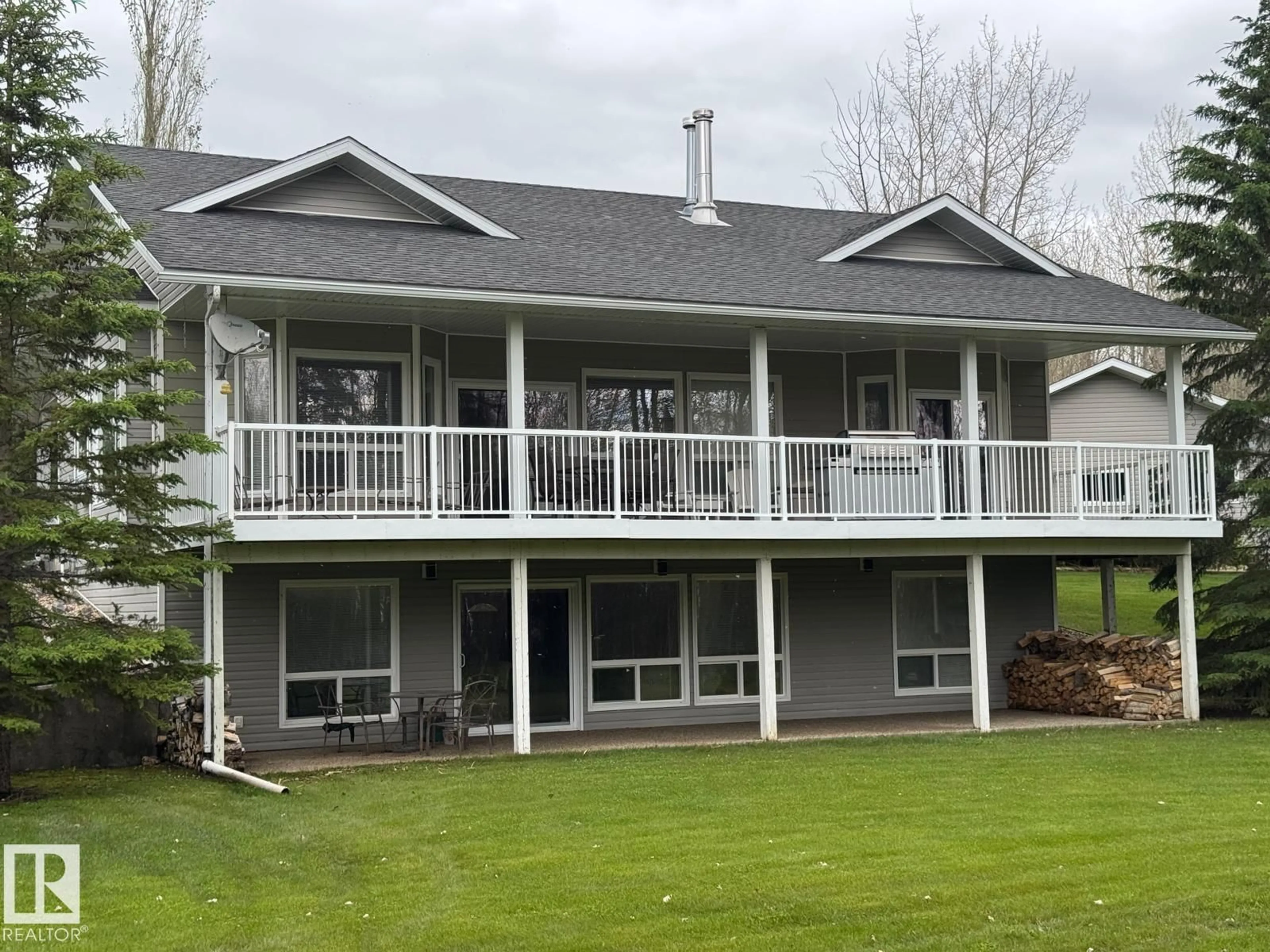 Home with vinyl exterior material, water/lake/river/ocean view for 465022 - 74 RANGE ROAD 61, Rural Wetaskiwin County Alberta T0C0T0