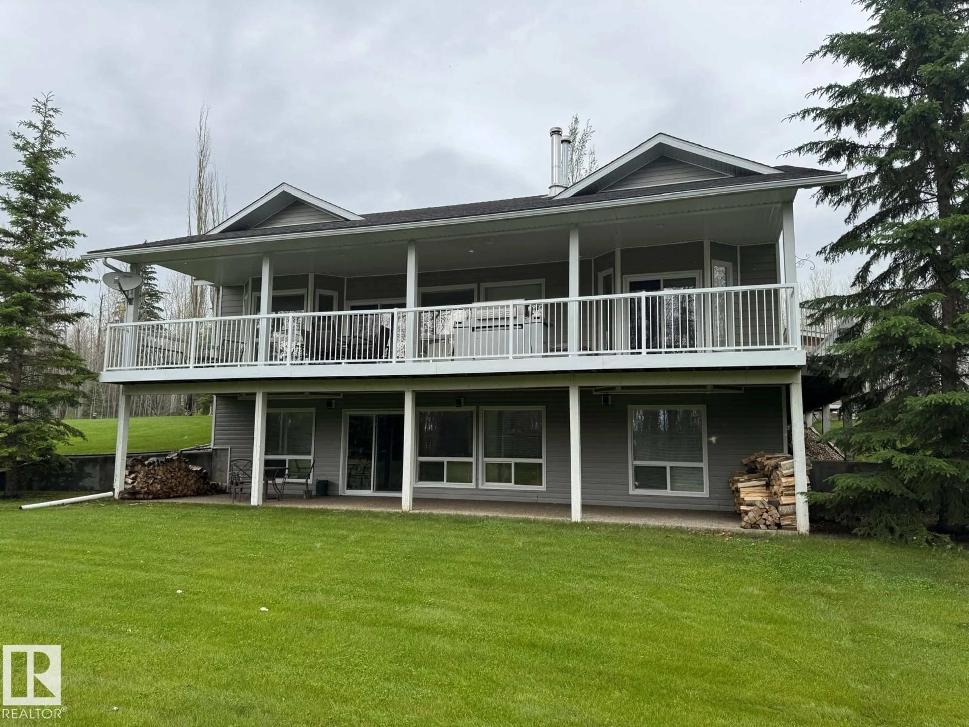 A pic from outside/outdoor area/front of a property/back of a property/a pic from drone, water/lake/river/ocean view for 465022 - 74 RANGE ROAD 61, Rural Wetaskiwin County Alberta T0C0T0