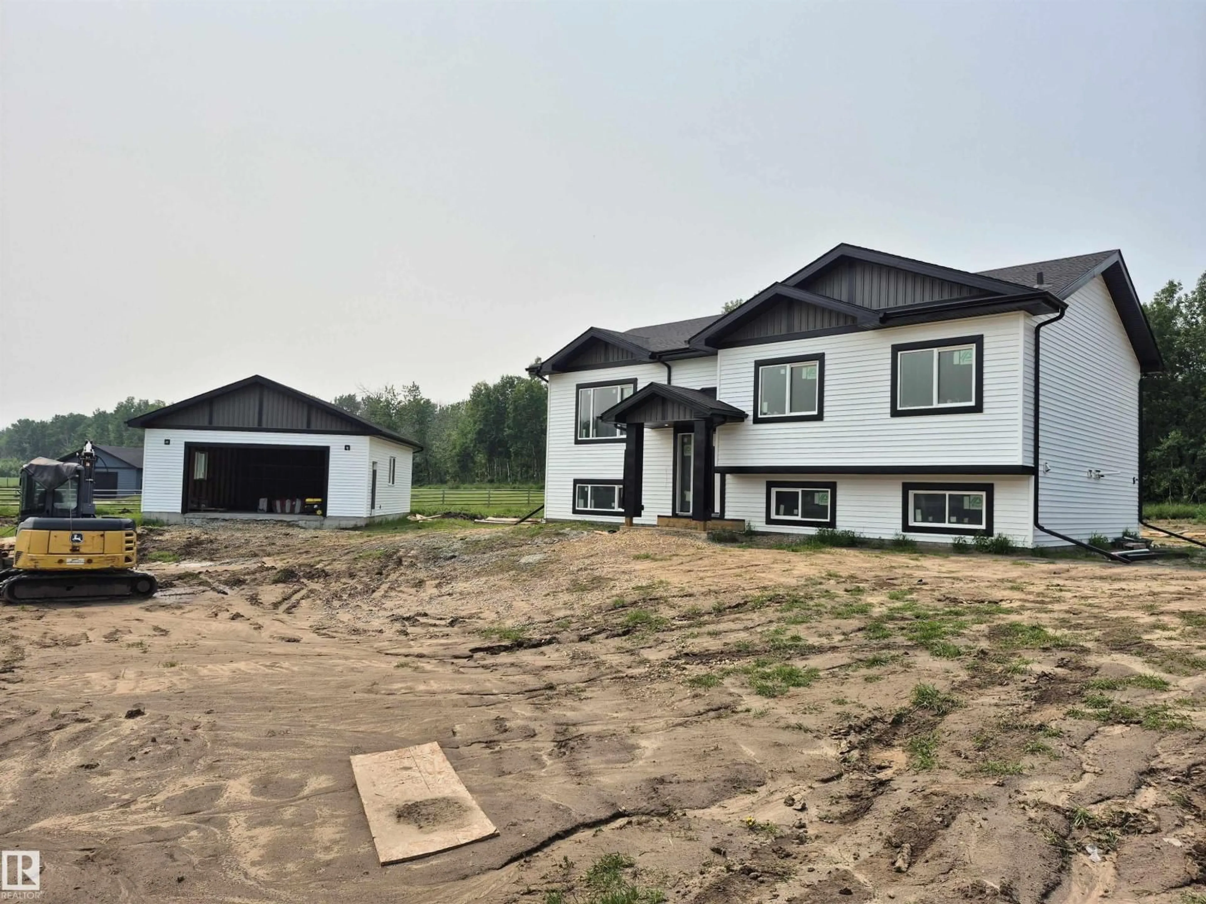 A pic from outside/outdoor area/front of a property/back of a property/a pic from drone, building for #401 - 55108 RANGE ROAD 15, Rural Lac Ste. Anne County Alberta T0E1V0