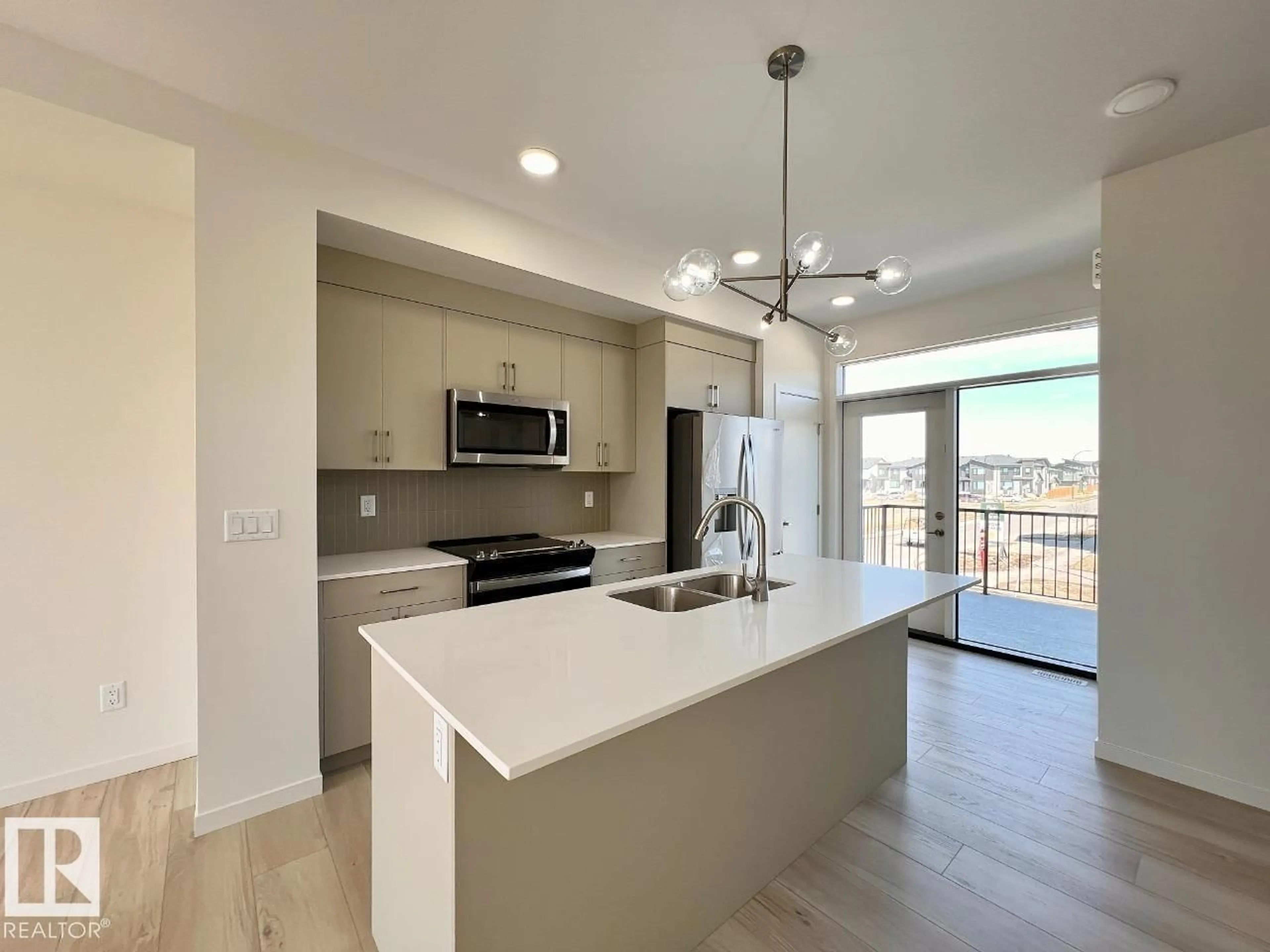 Open concept kitchen, unknown for 2646 ALCES WY, Edmonton Alberta T6X2W6