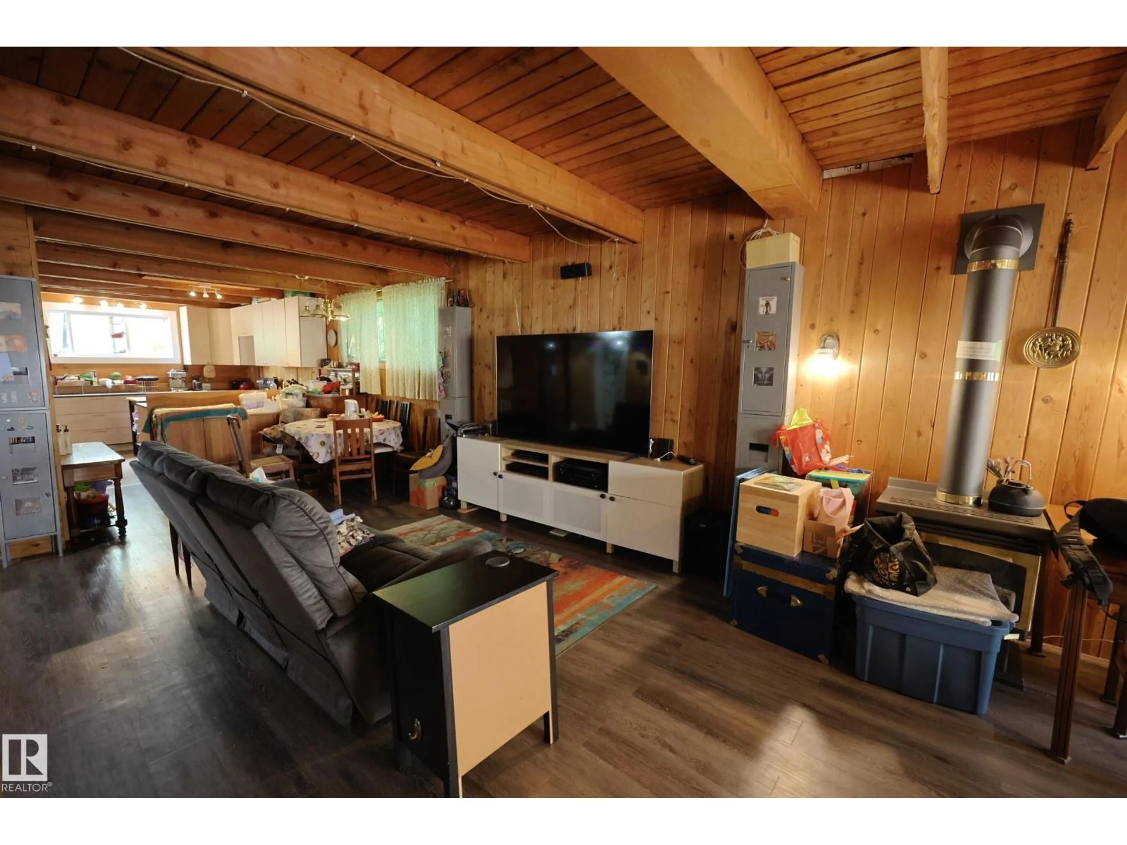 Living room with furniture, wood/laminate floor for 56512 RGE ROAD 23, Rural Lac Ste. Anne County Alberta T0E1V0