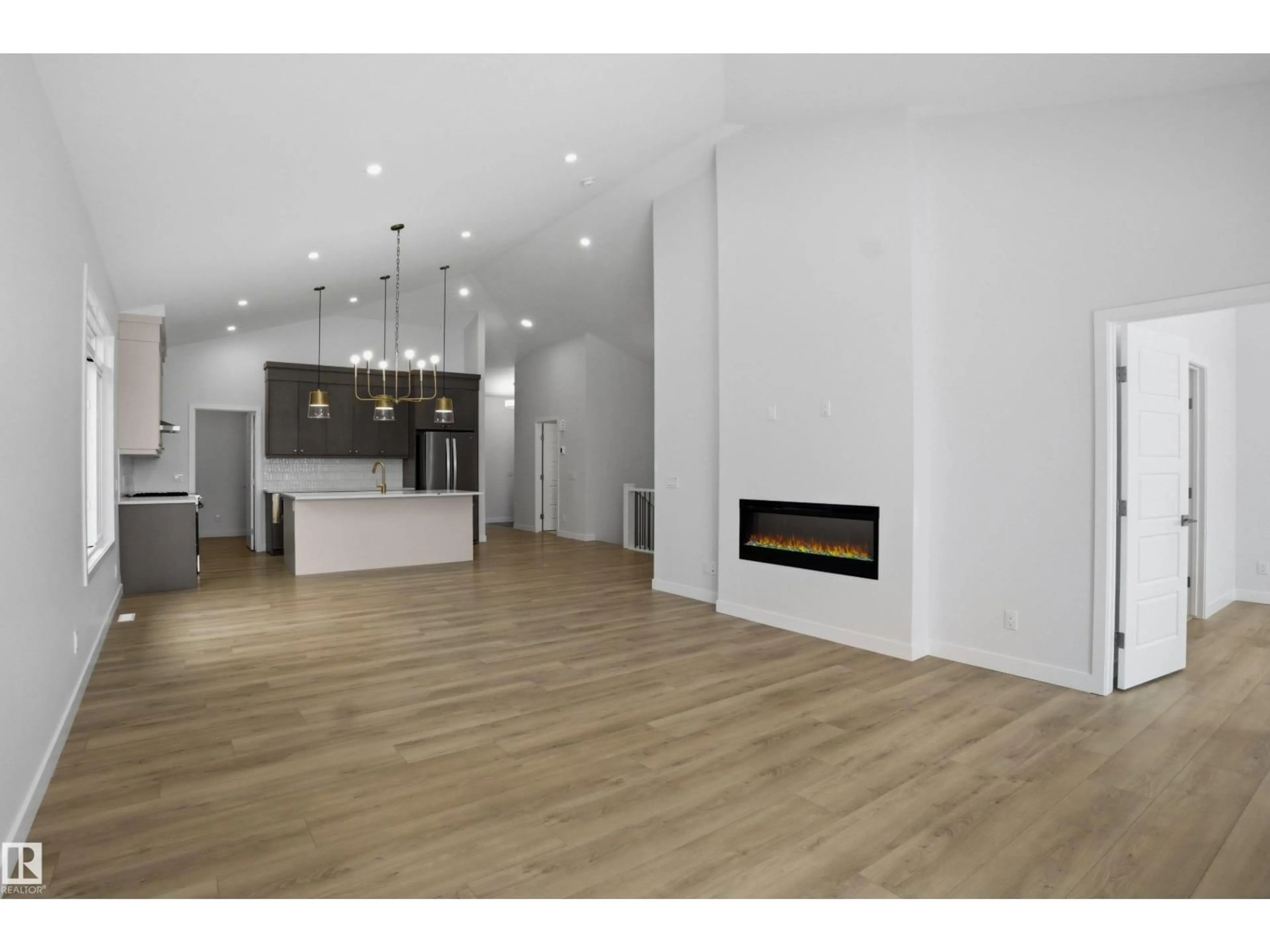 Open concept kitchen, wood/laminate floor for SW - 3706 CROSS LANDING LD, Edmonton Alberta T6W4M8