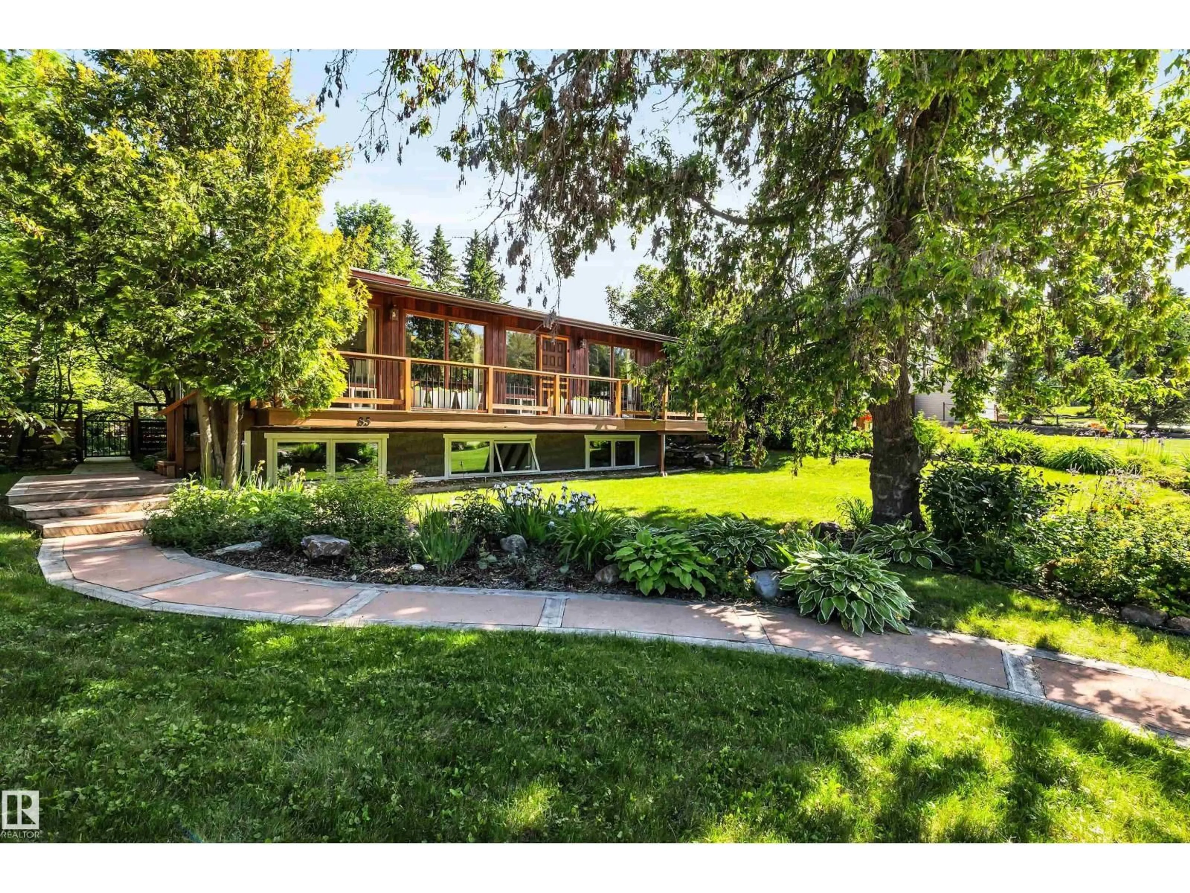 A pic from outside/outdoor area/front of a property/back of a property/a pic from drone, water/lake/river/ocean view for 85 RIVER DR, Devon Alberta T9G1C7