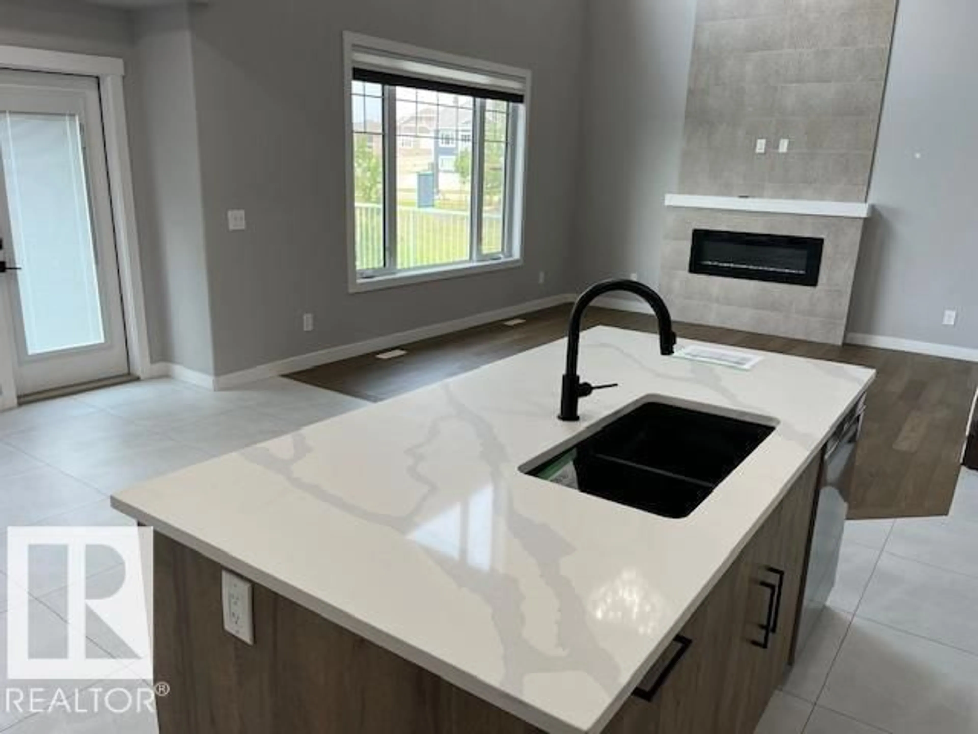 Open concept kitchen, ceramic/tile floor for 3810 46 AV, Beaumont Alberta T4X2Y7