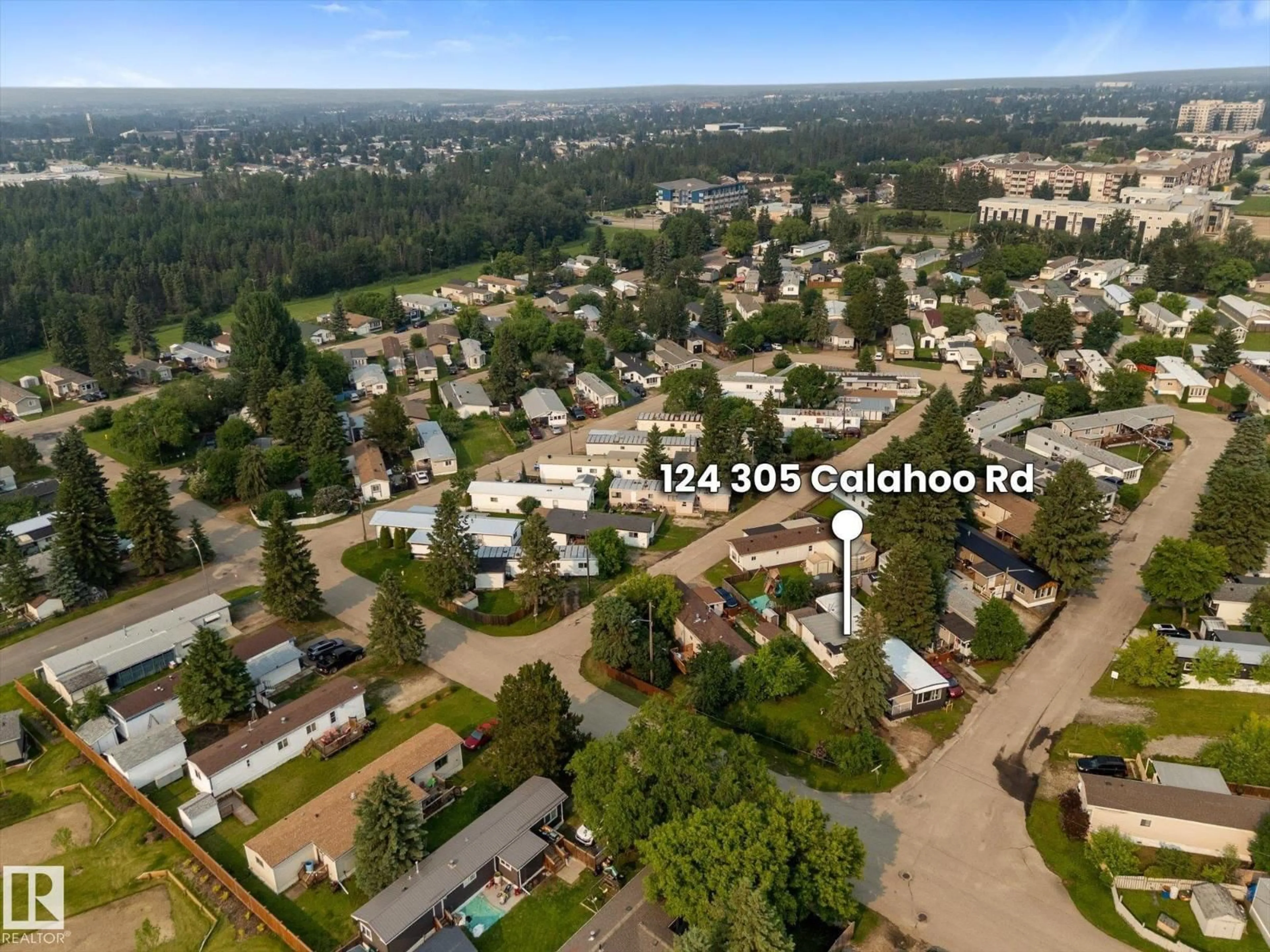 A pic from outside/outdoor area/front of a property/back of a property/a pic from drone, street for 305 - 124 CALAHOO RD, Spruce Grove Alberta T7X3K7