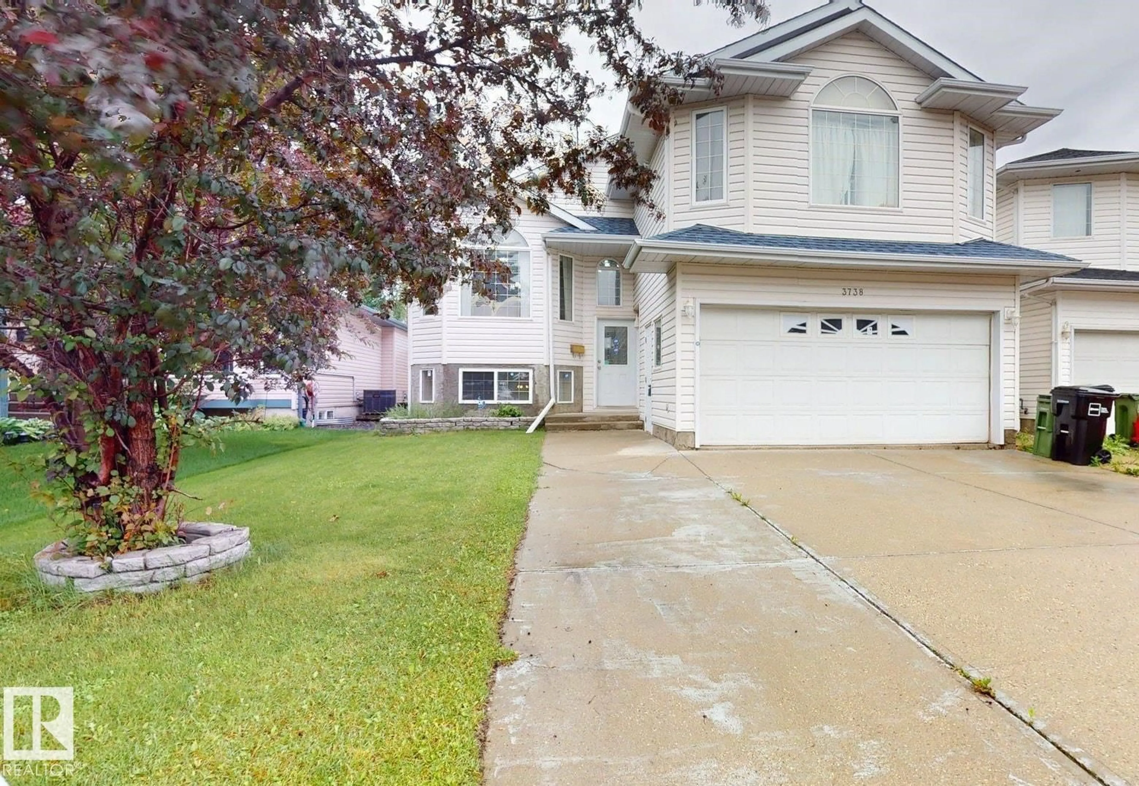 Home with vinyl exterior material, street for NW - 3738 28A ST, Edmonton Alberta T6T1M3