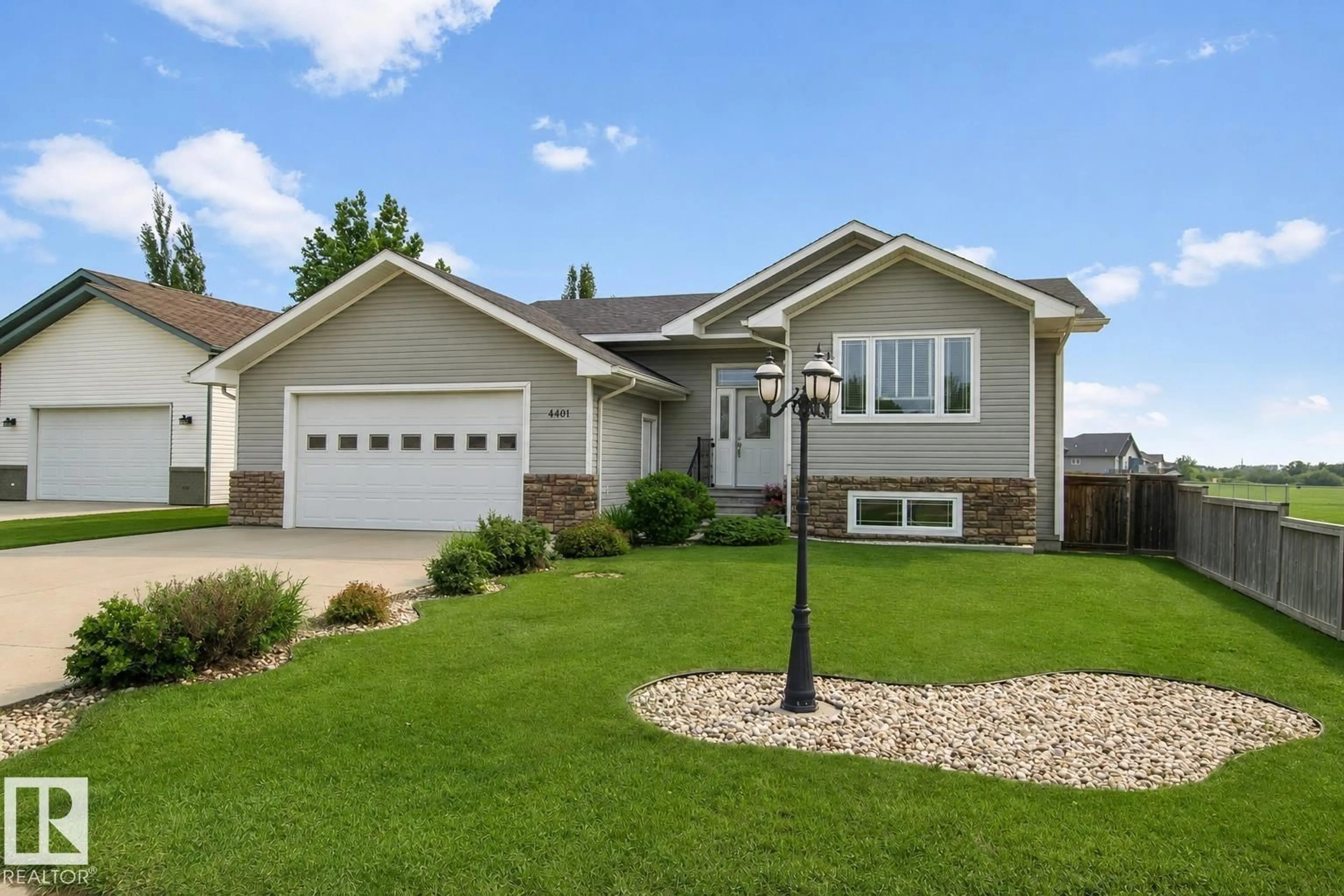 Home with vinyl exterior material, street for 4401 39 ST, Bonnyville Town Alberta T9N2P4