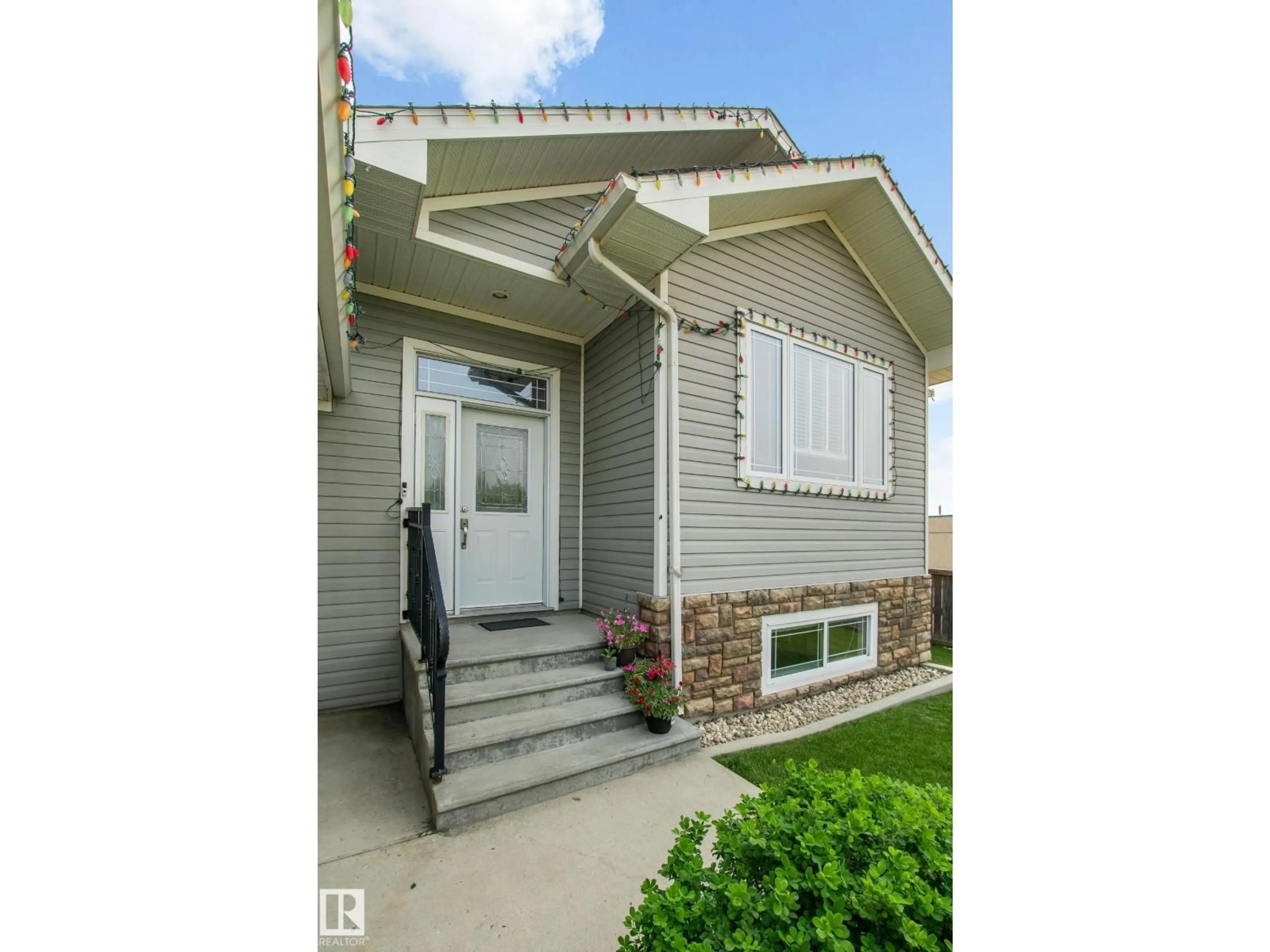 Home with vinyl exterior material, street for 4401 39 ST, Bonnyville Town Alberta T9N2P4