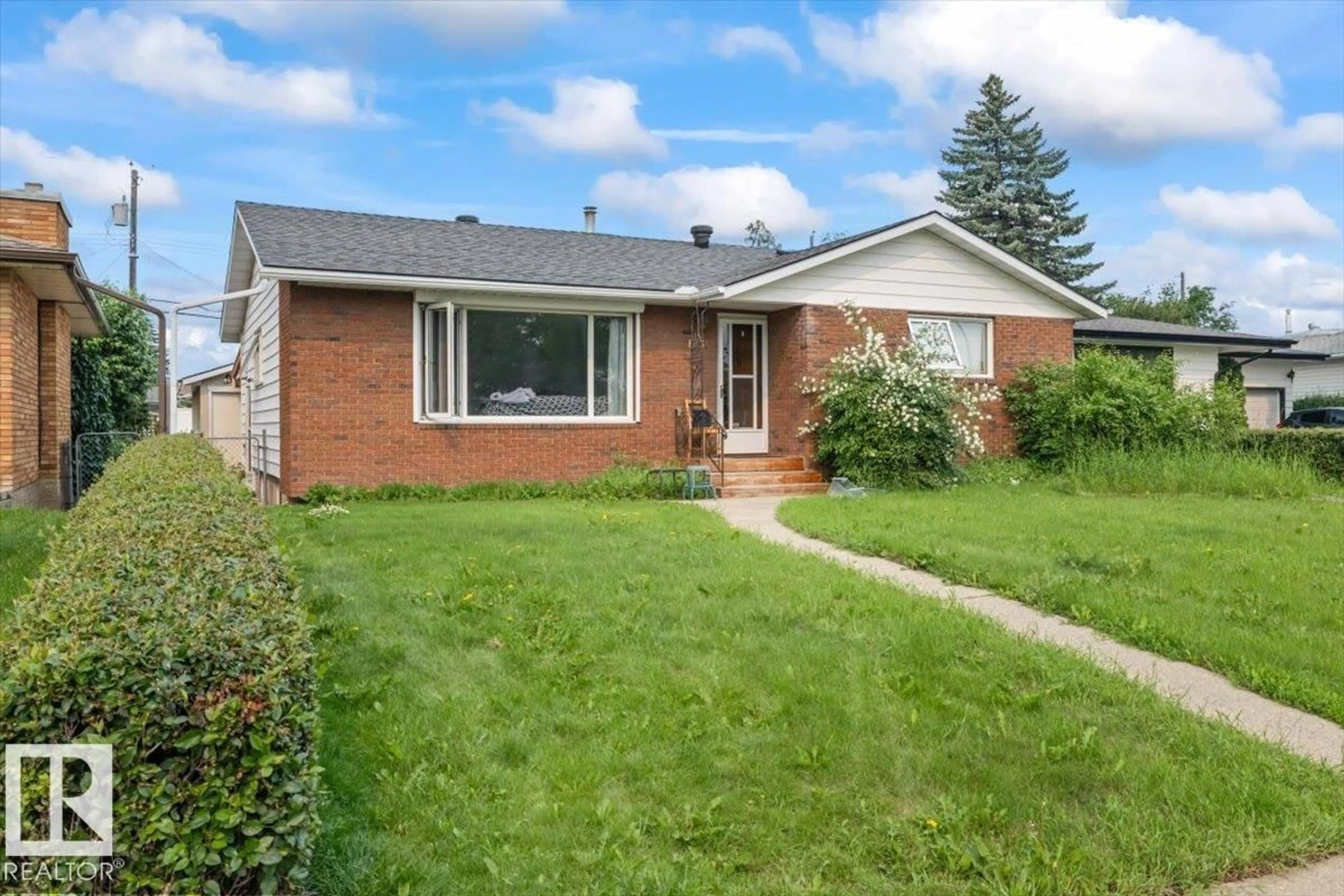 Home with brick exterior material, street for NW - 8736 72 ST, Edmonton Alberta T6B1Y5