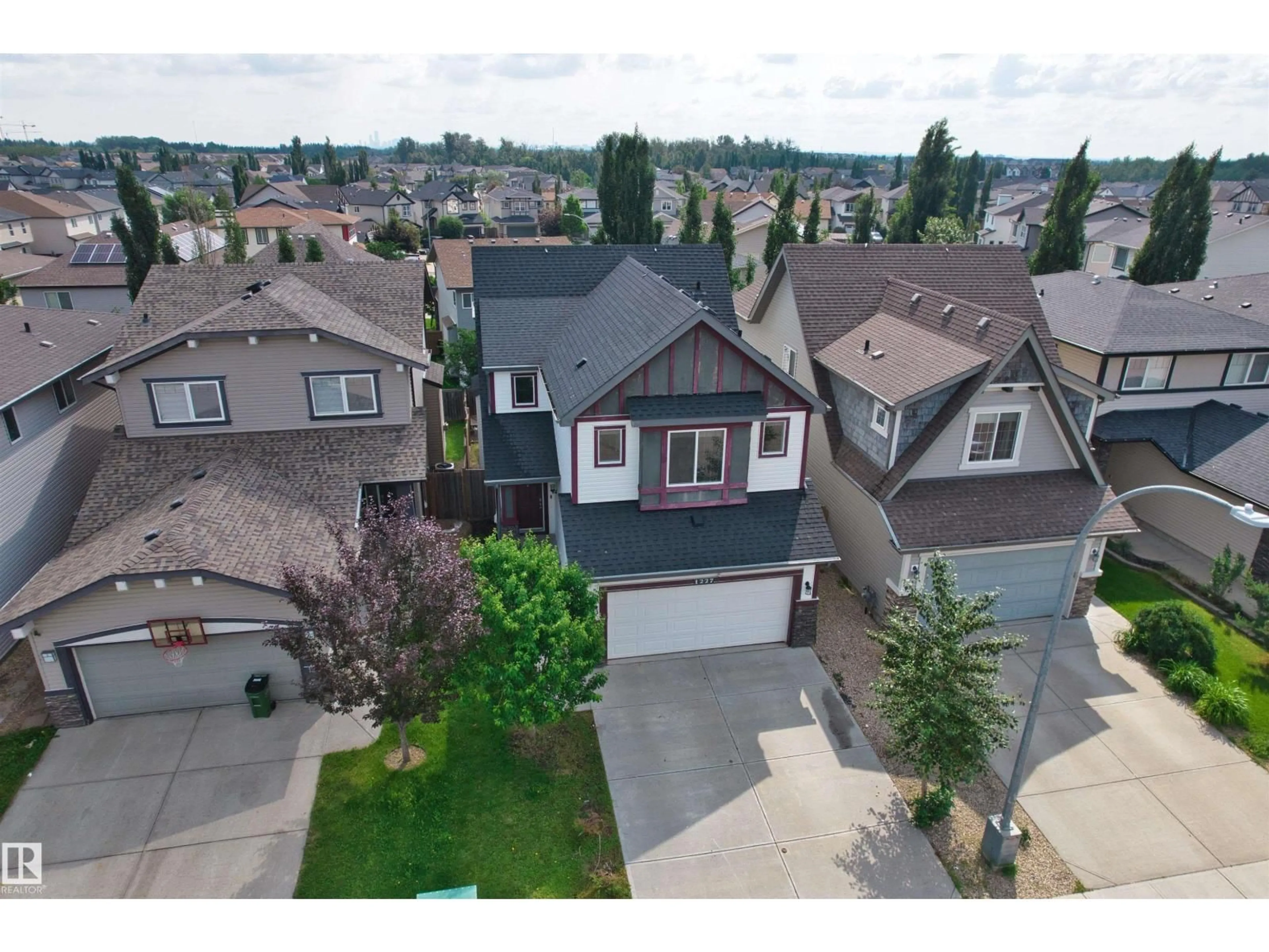 A pic from outside/outdoor area/front of a property/back of a property/a pic from drone, street for 1227 SECORD LANDING LD, Edmonton Alberta T5T4N3