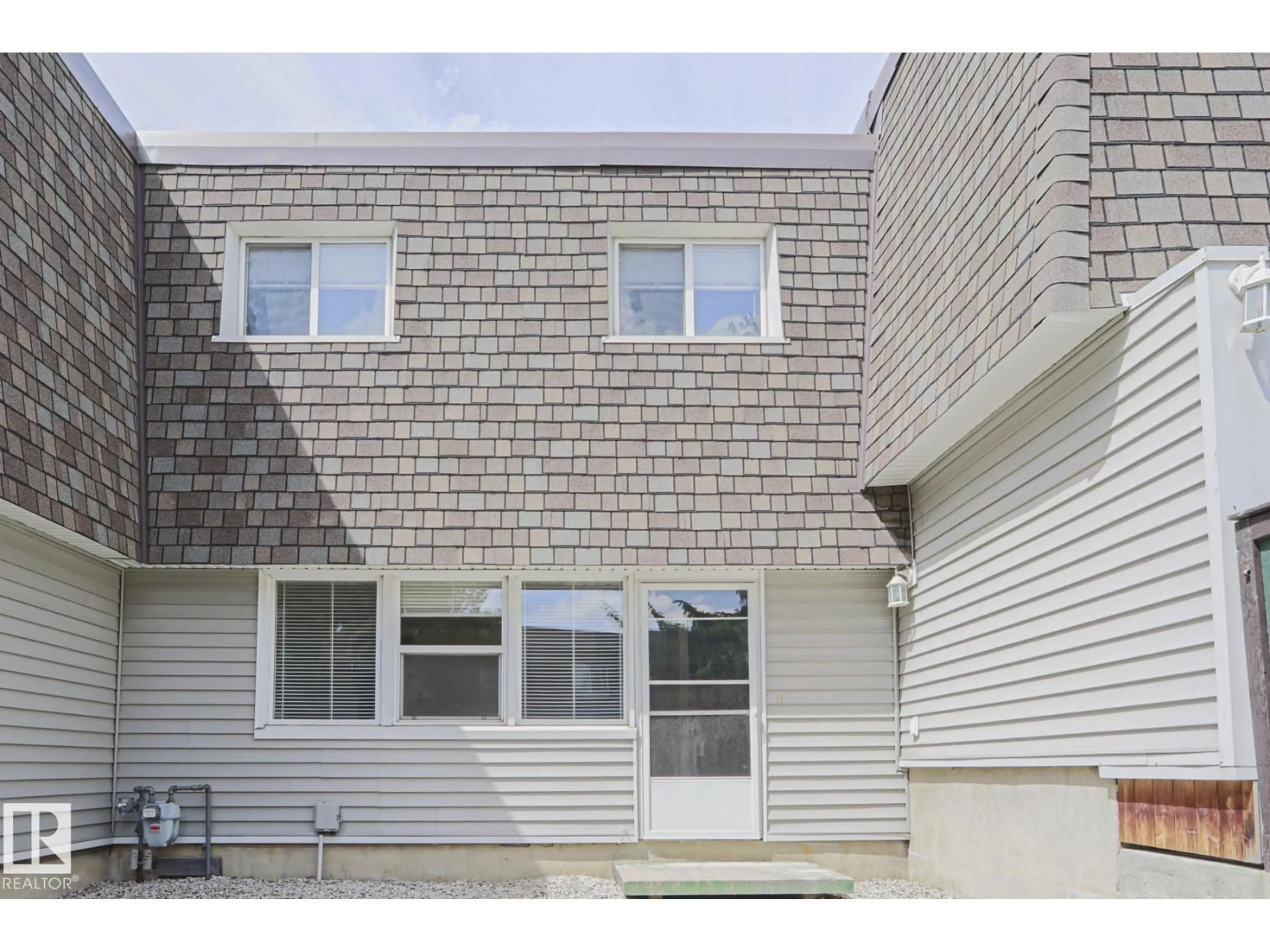 Home with vinyl exterior material, street for 603 VILLAGE ON THE GREEN GR, Edmonton Alberta T5A1A2