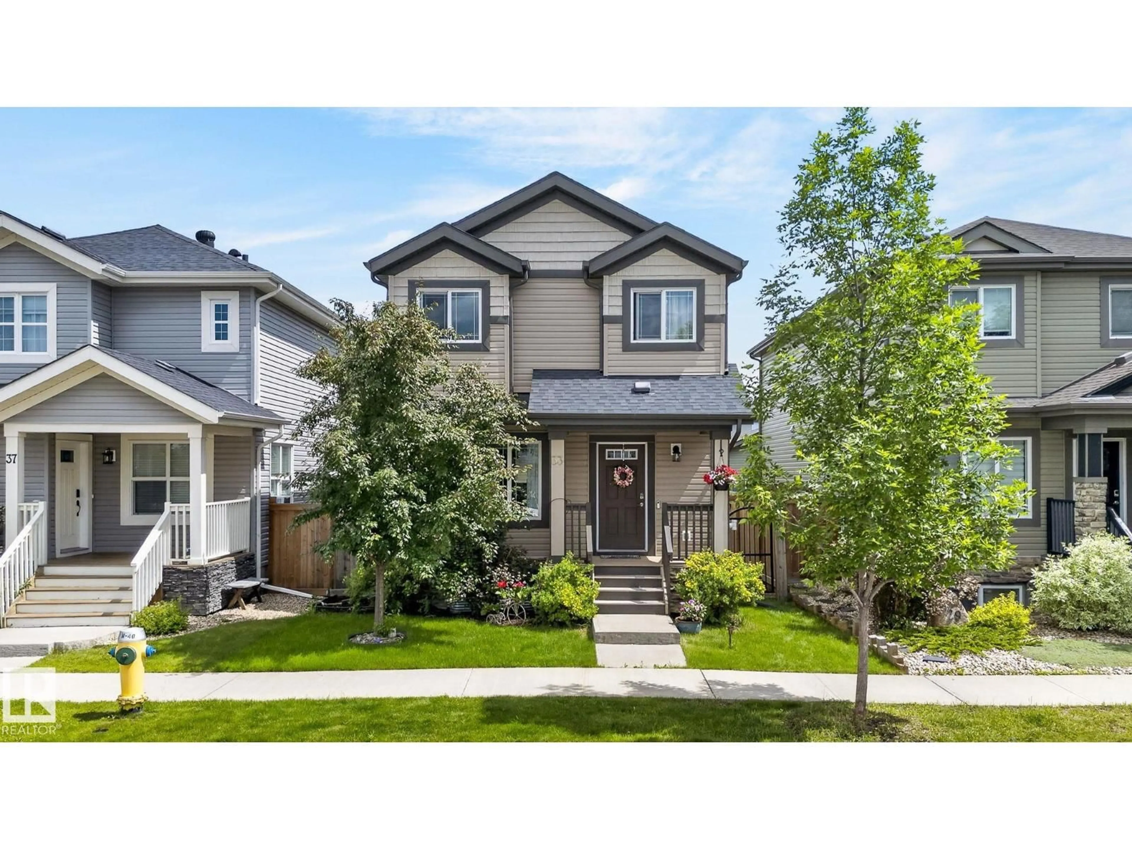 Home with vinyl exterior material, street for 33 DURRAND BN, Fort Saskatchewan Alberta T8L0N1