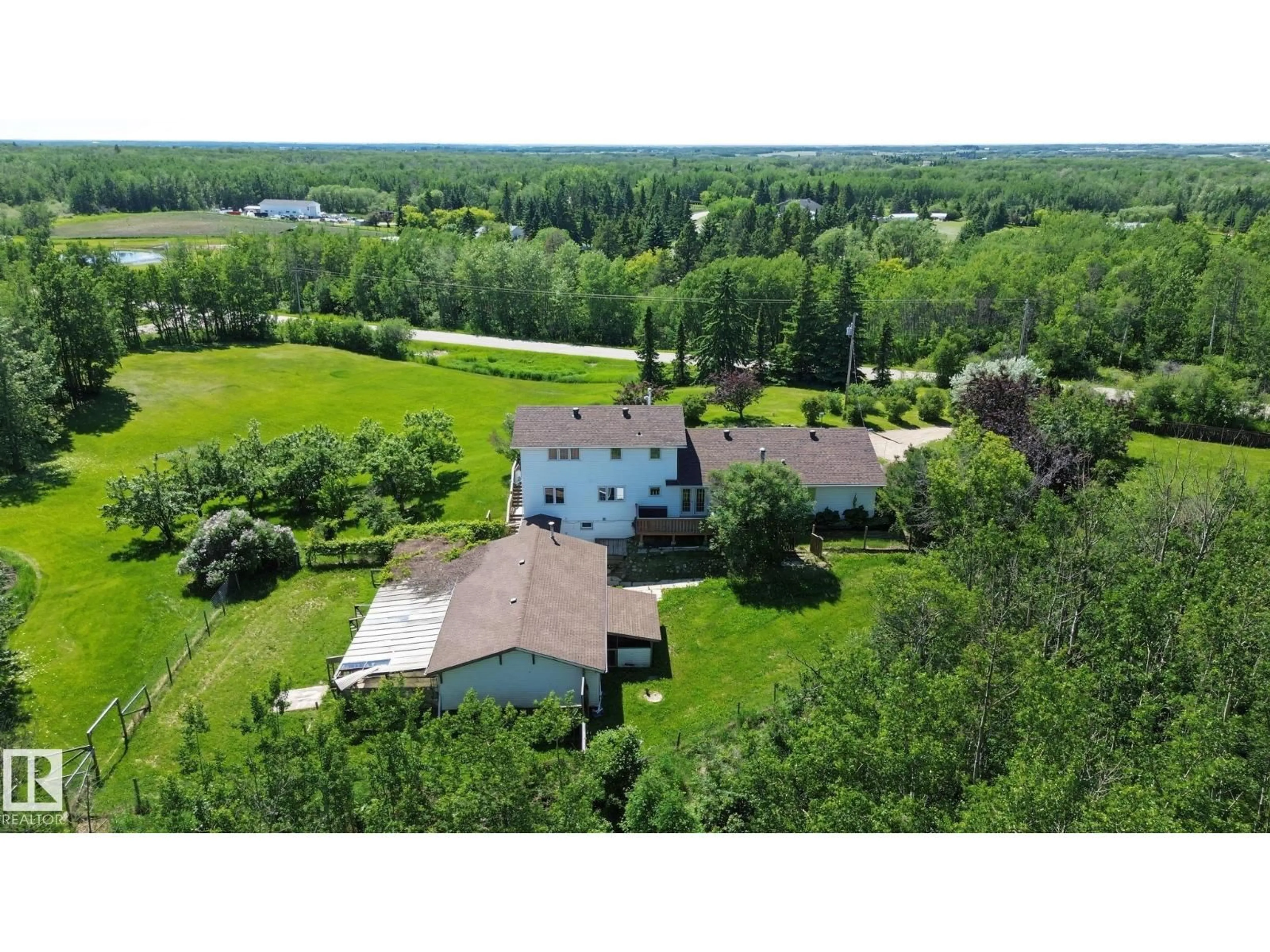 A pic from outside/outdoor area/front of a property/back of a property/a pic from drone, unknown for 51357 RGE ROAD 231, Rural Strathcona County Alberta T8B1K7