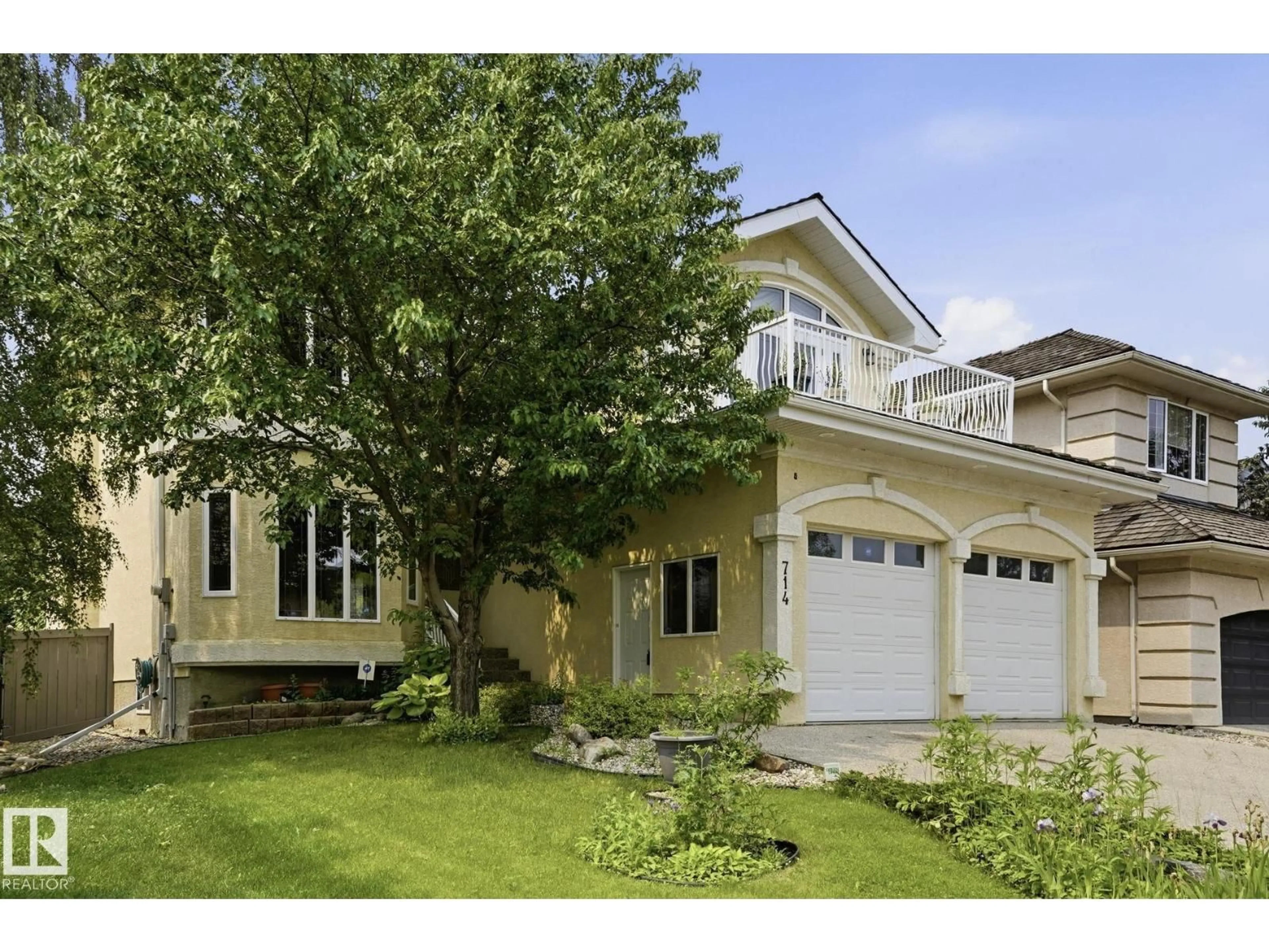 Home with vinyl exterior material, street for 714 DALHOUSIE WY, Edmonton Alberta T6M2V3