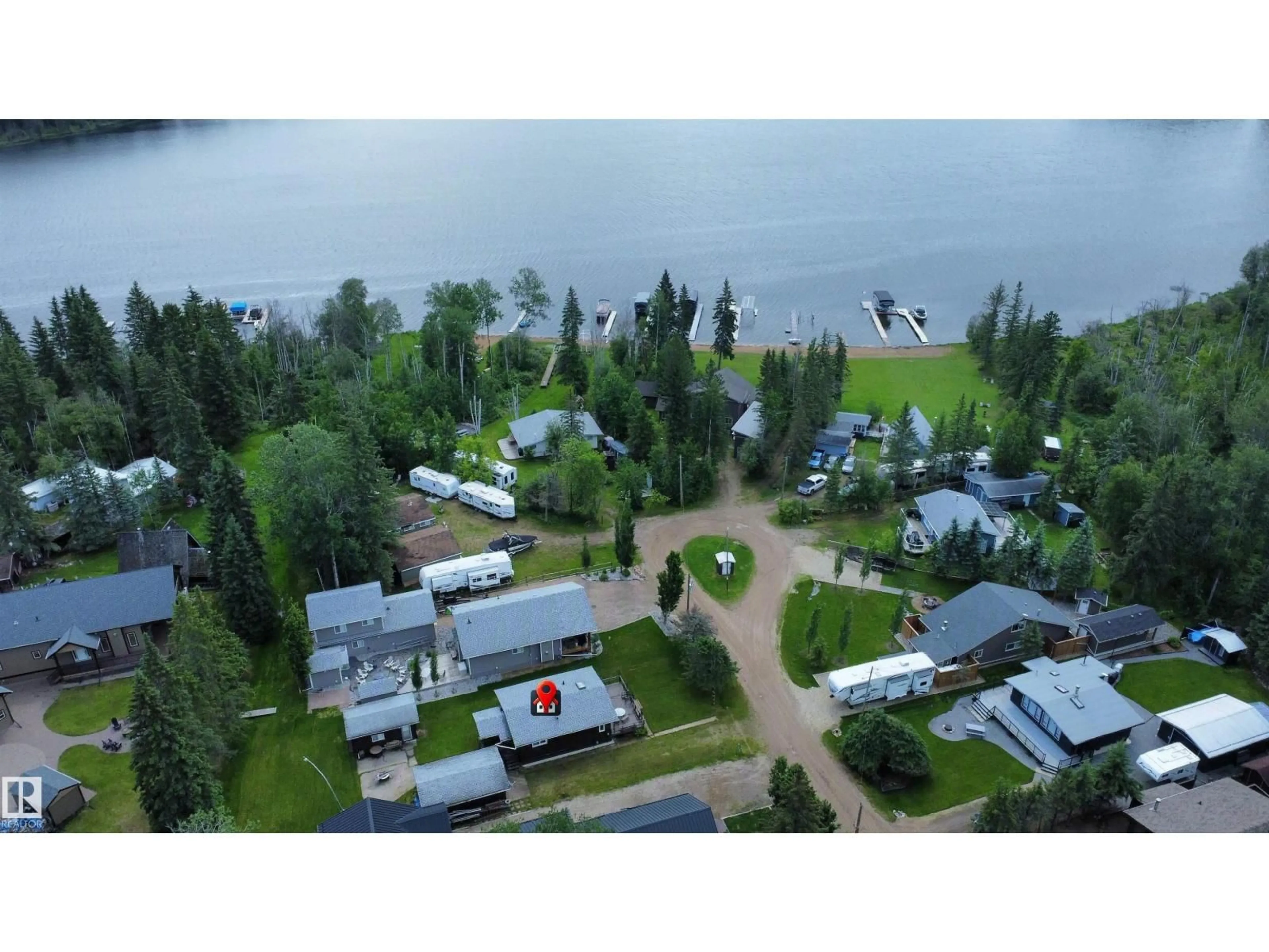 A pic from outside/outdoor area/front of a property/back of a property/a pic from drone, water/lake/river/ocean view for 603 LONG LAKE DR, Long Lake Alberta T6A0M0