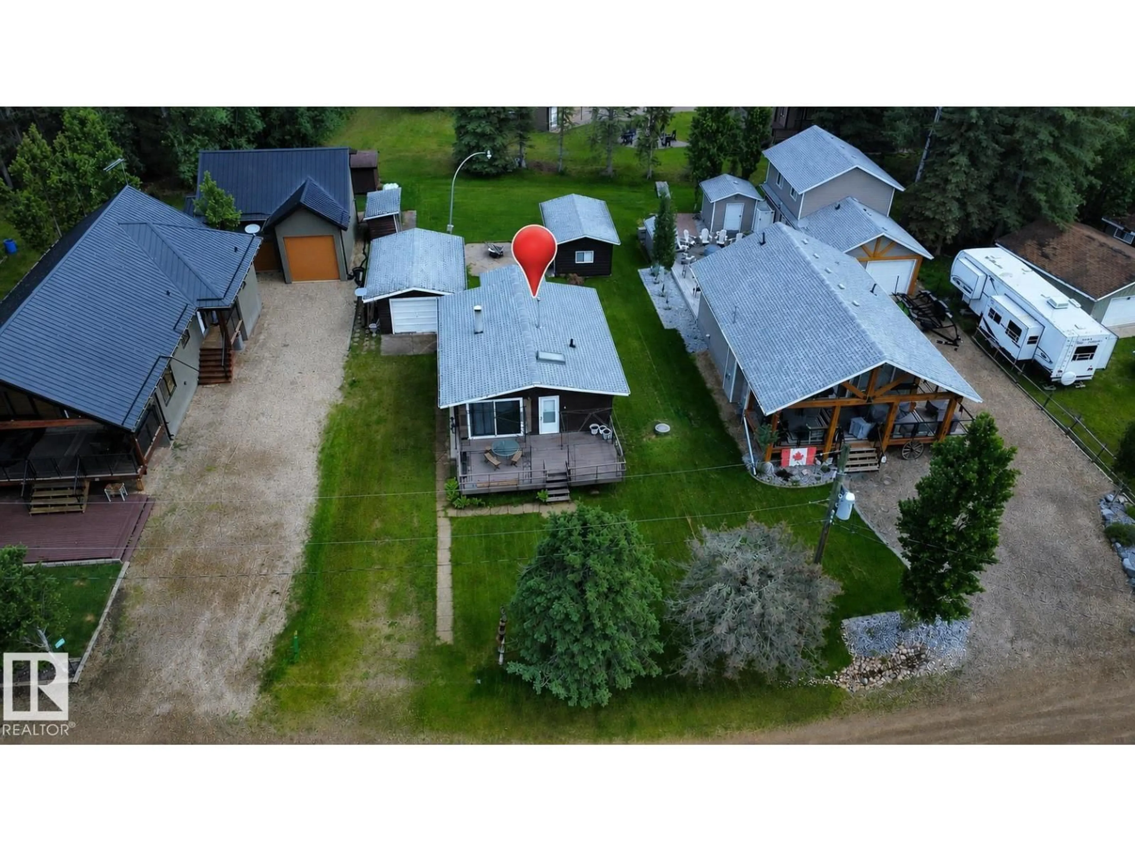 A pic from outside/outdoor area/front of a property/back of a property/a pic from drone, unknown for 603 LONG LAKE DR, Long Lake Alberta T6A0M0