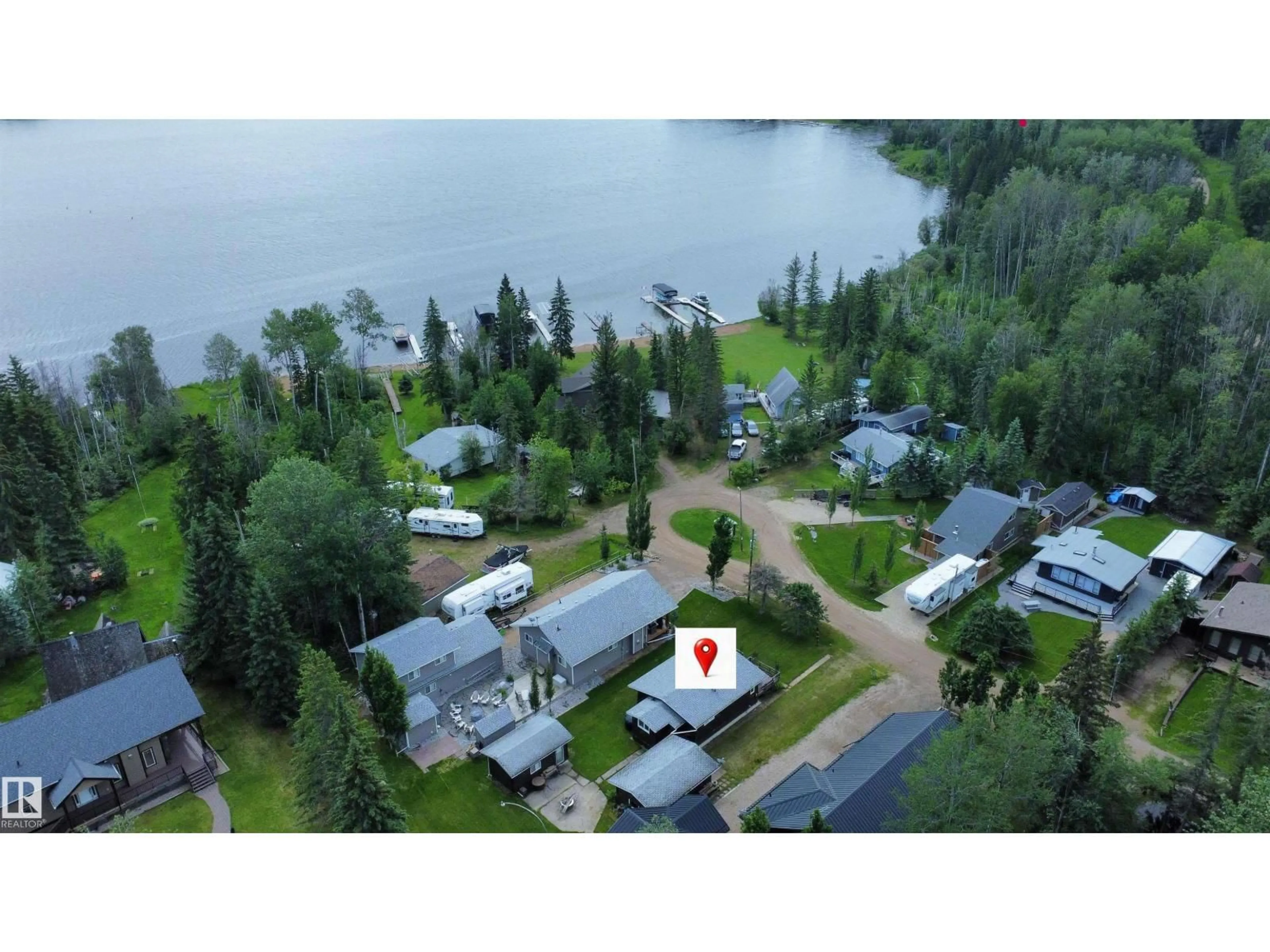 A pic from outside/outdoor area/front of a property/back of a property/a pic from drone, water/lake/river/ocean view for 603 LONG LAKE DR, Long Lake Alberta T6A0M0