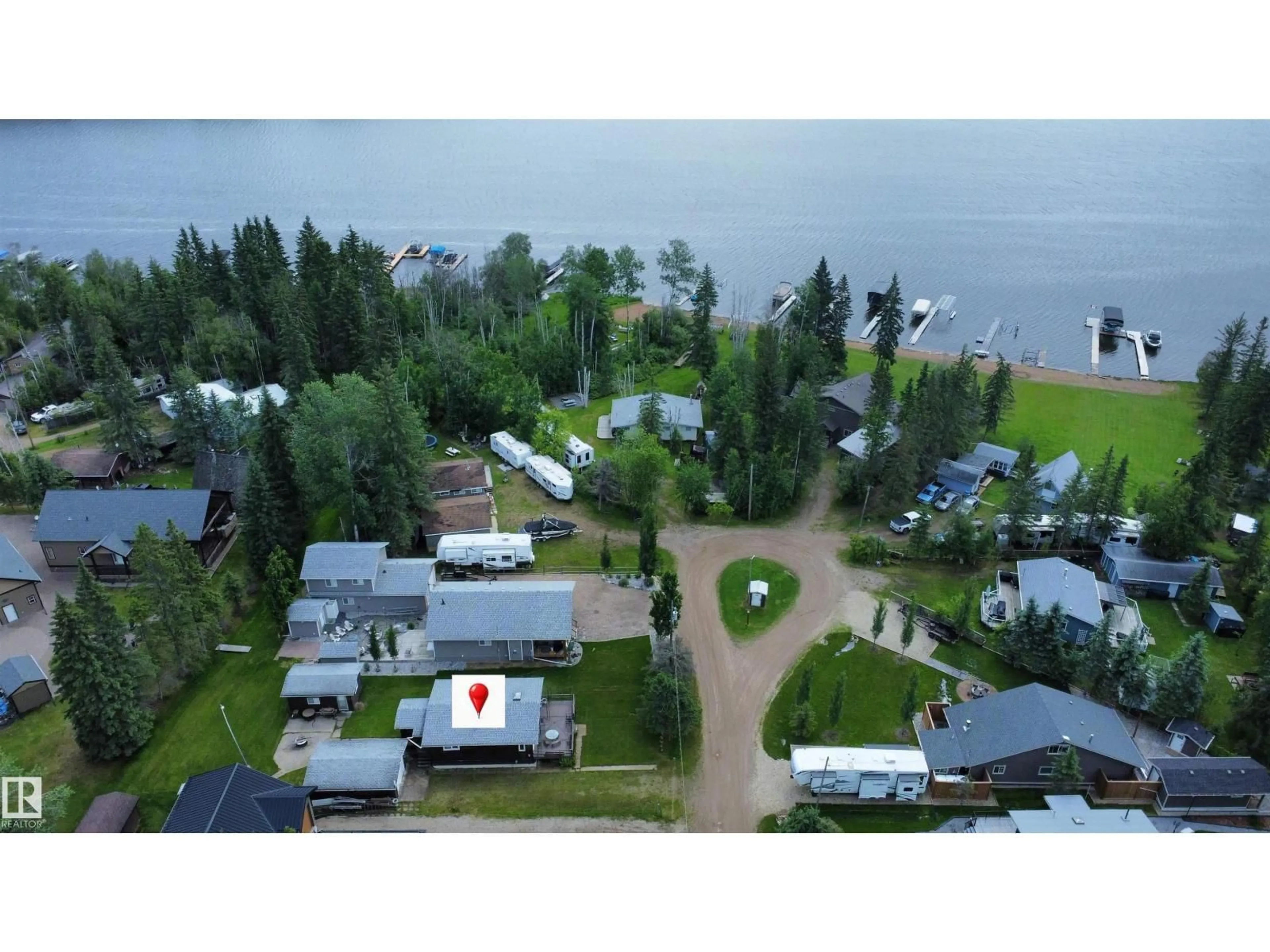 A pic from outside/outdoor area/front of a property/back of a property/a pic from drone, water/lake/river/ocean view for 603 LONG LAKE DR, Long Lake Alberta T6A0M0