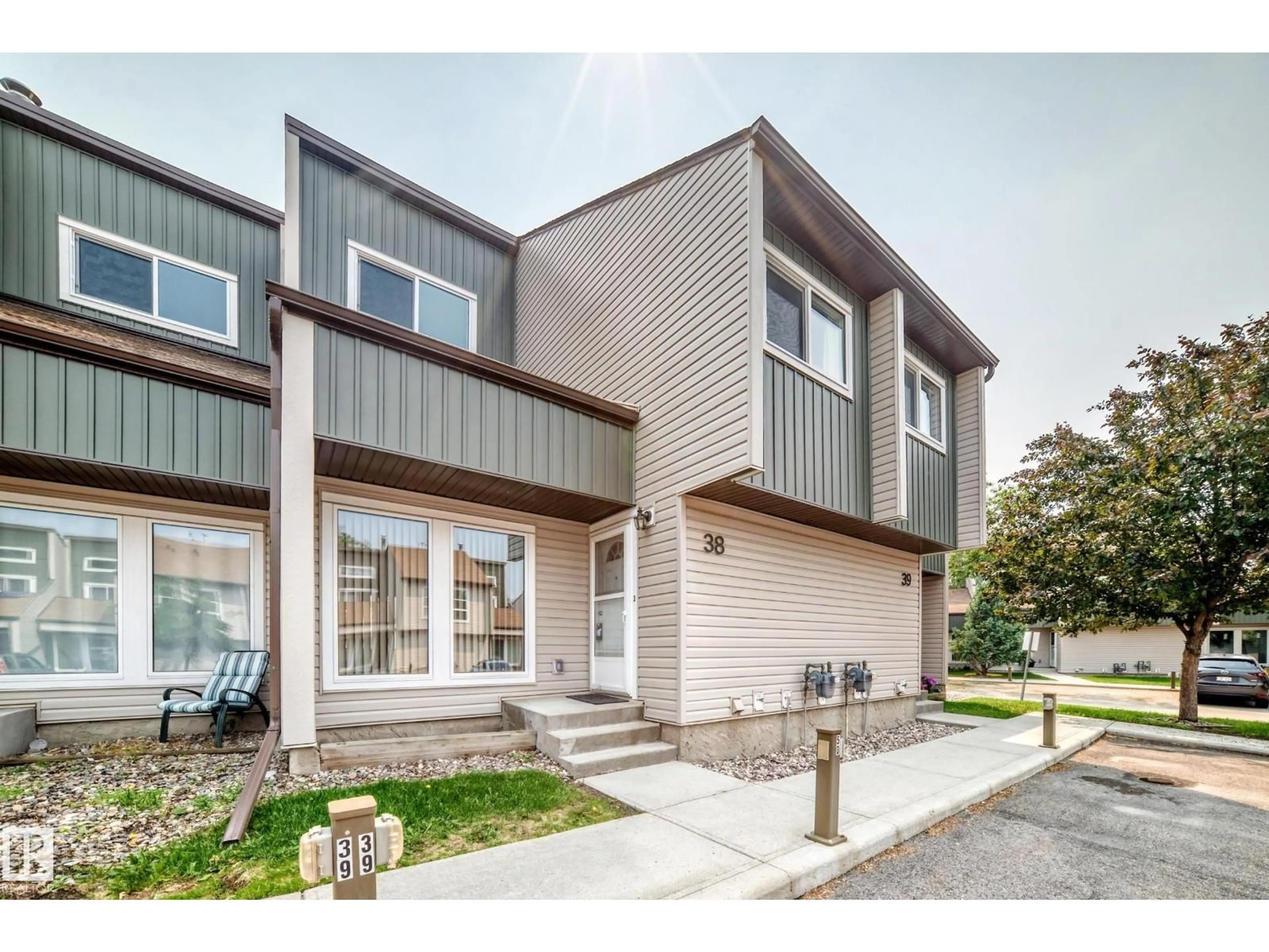 Home with brick exterior material, street for 38 2020 105 ST NW, Edmonton Alberta T6J5J2