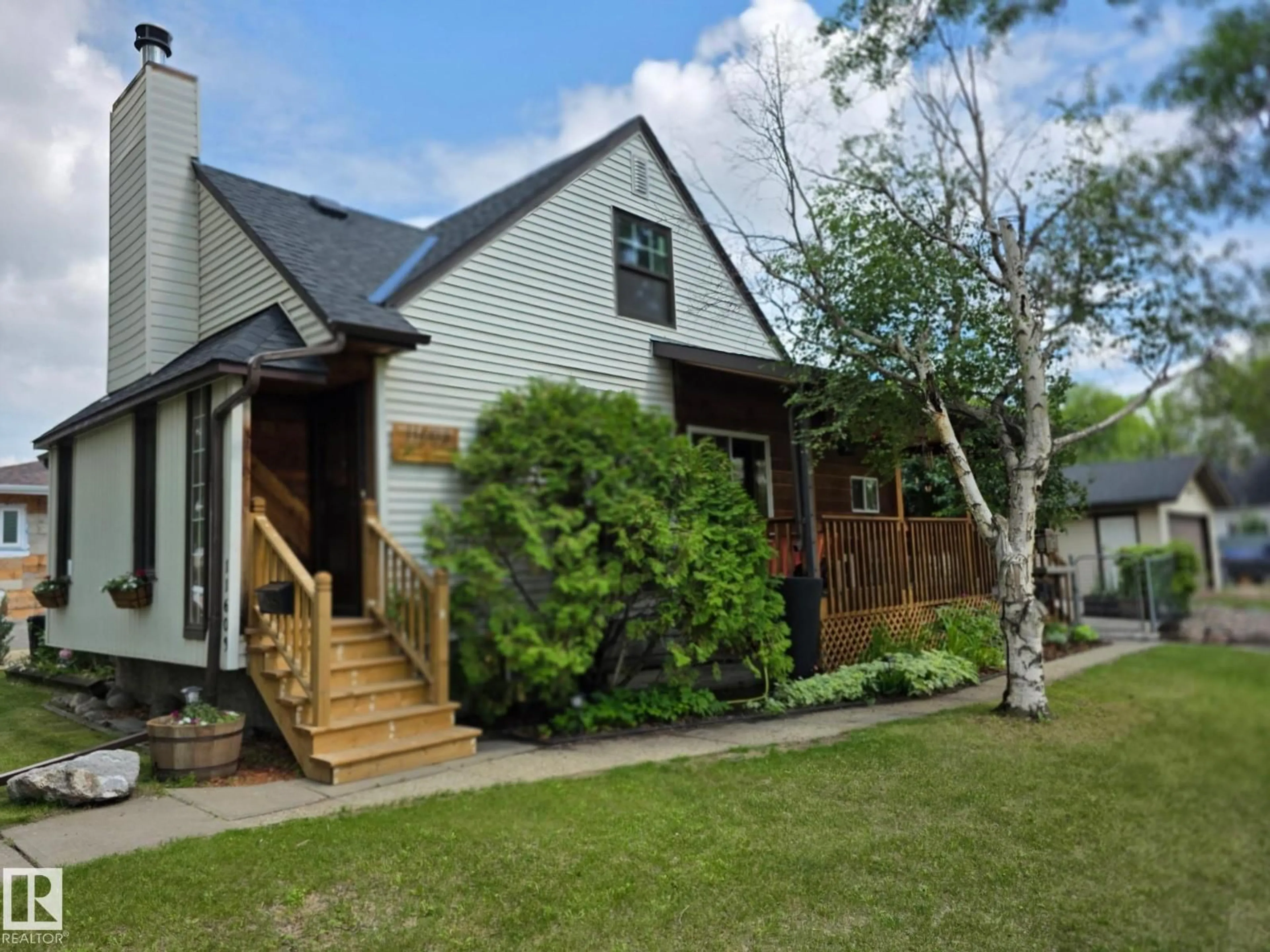 Home with vinyl exterior material, street for 11603 70 ST, Edmonton Alberta T5B1T6
