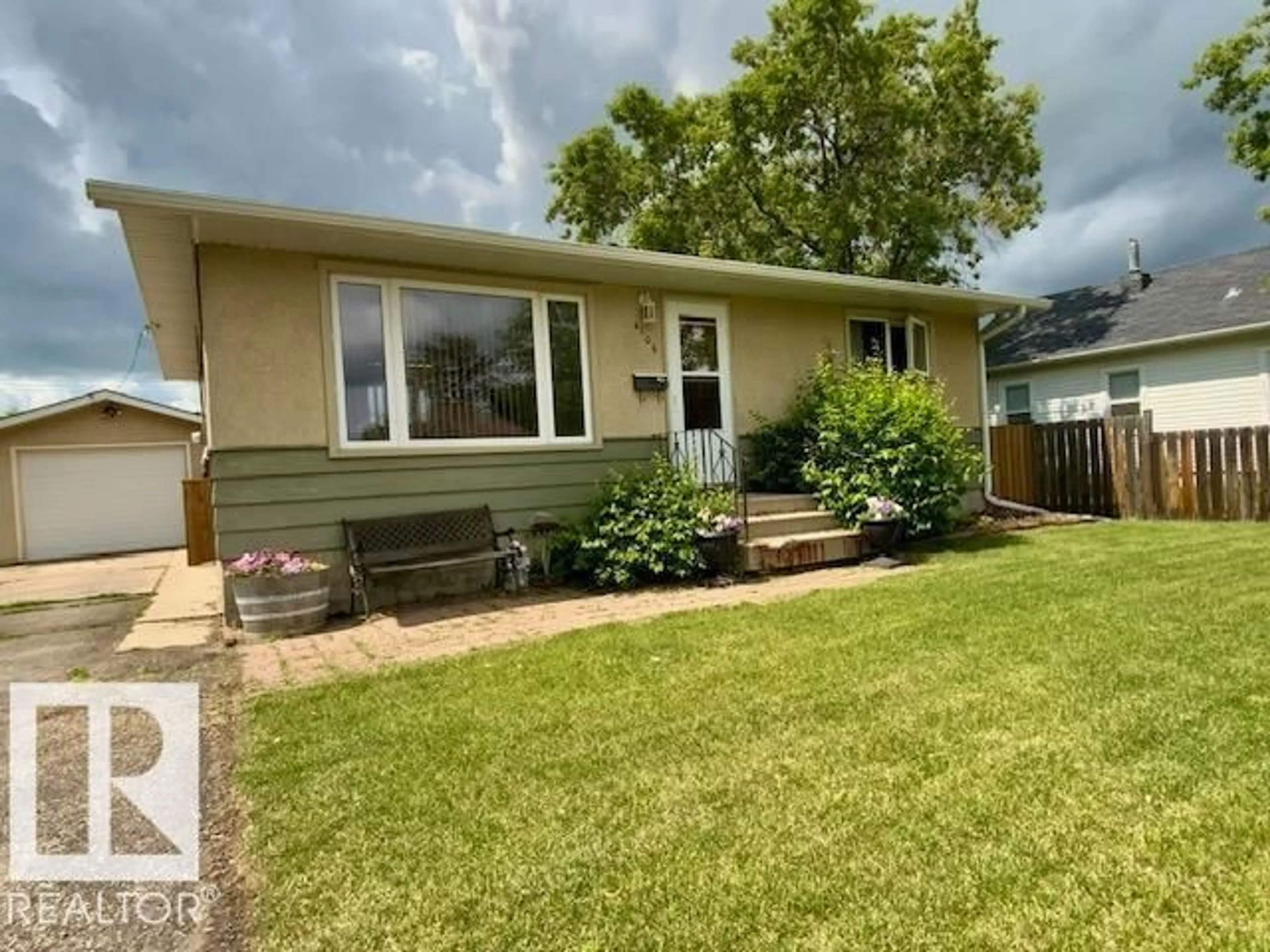 Home with vinyl exterior material, street for 4106 51A ST, Wetaskiwin Alberta T9A1L8