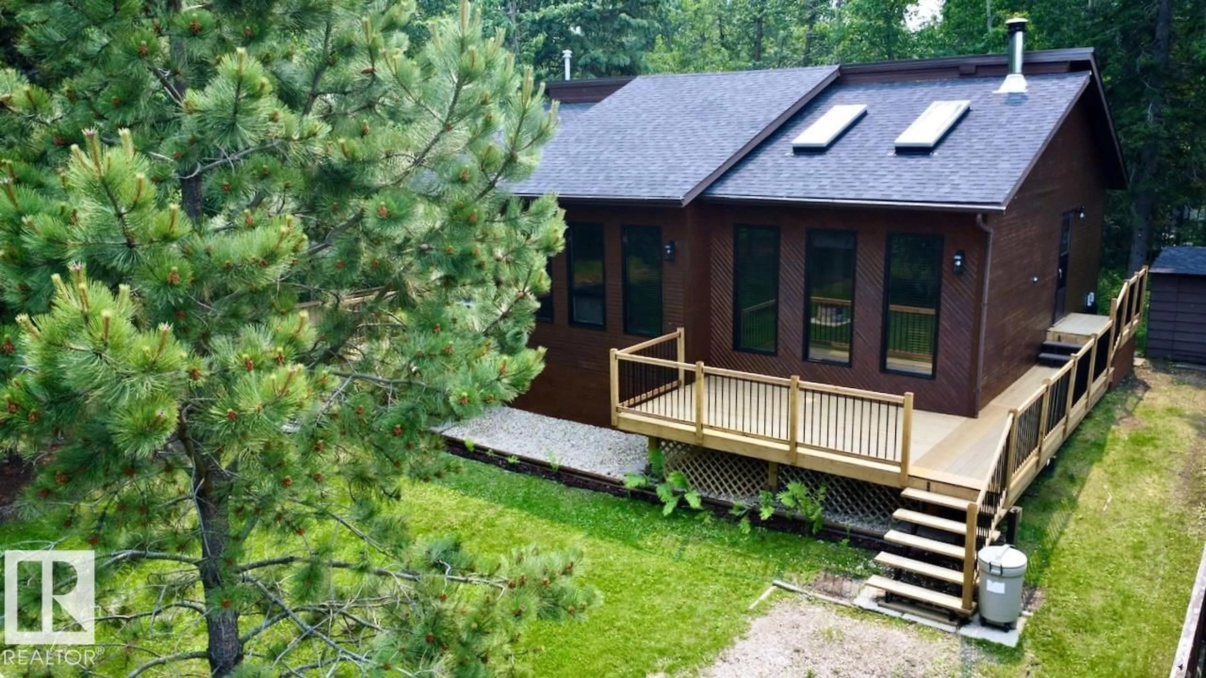A pic from outside/outdoor area/front of a property/back of a property/a pic from drone, unknown for 5 BIRCH AV, Rural Lac Ste. Anne County Alberta T0E0L0