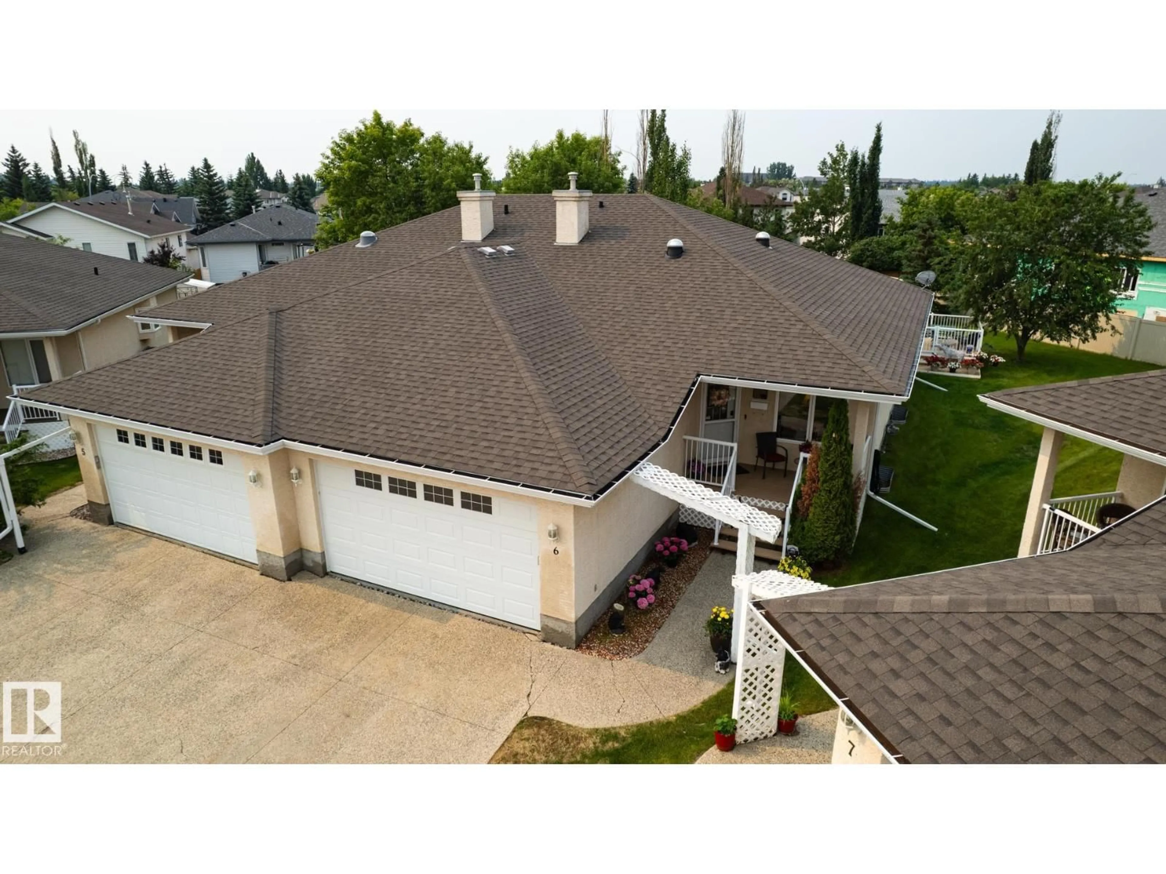 A pic from outside/outdoor area/front of a property/back of a property/a pic from drone, unknown for 9 - 6 DEER PARK DR, Spruce Grove Alberta T7X4H8
