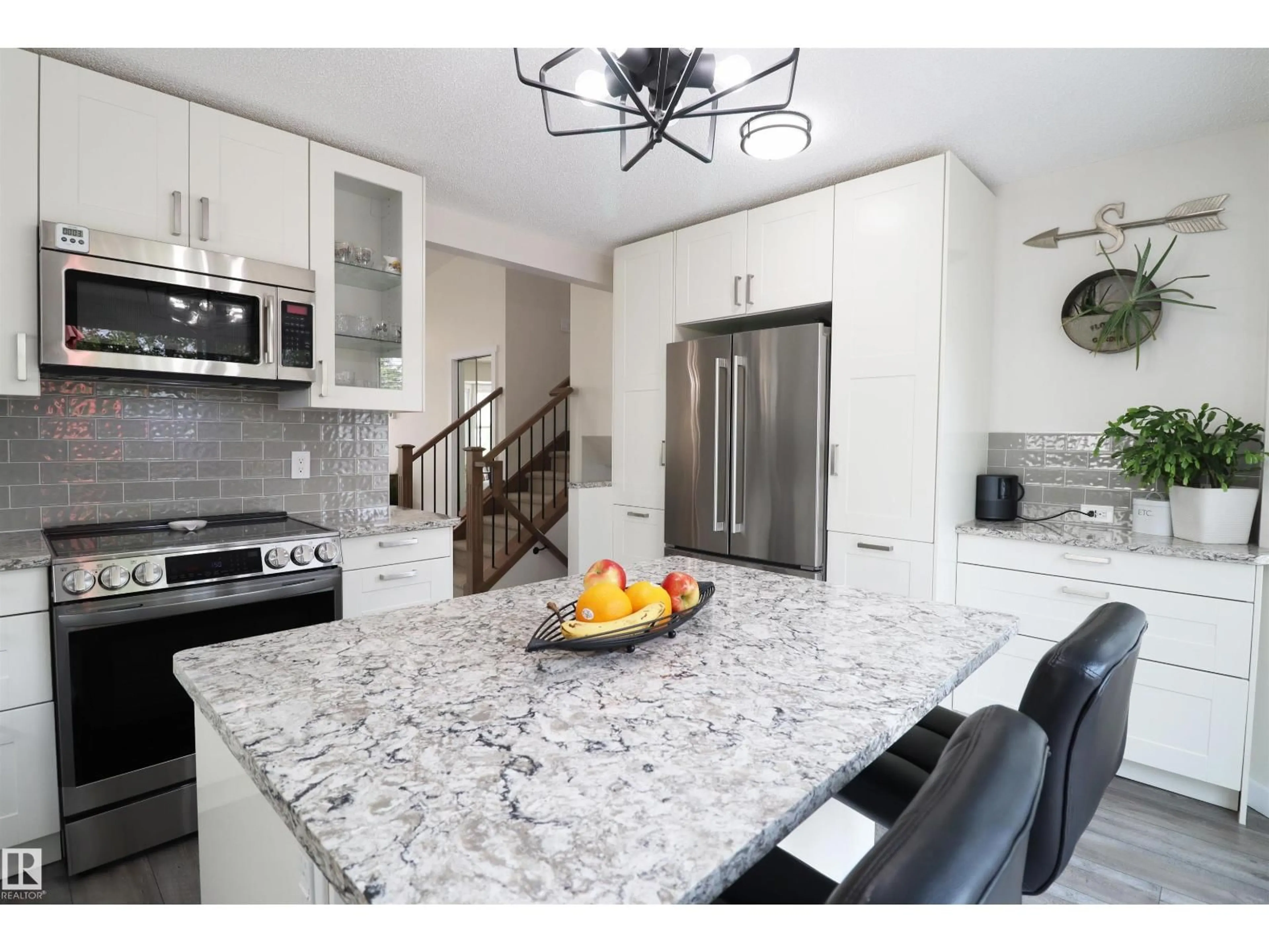 Open concept kitchen, ceramic/tile floor for 20 ABERDEEN WY, Stony Plain Alberta T7Z1K1