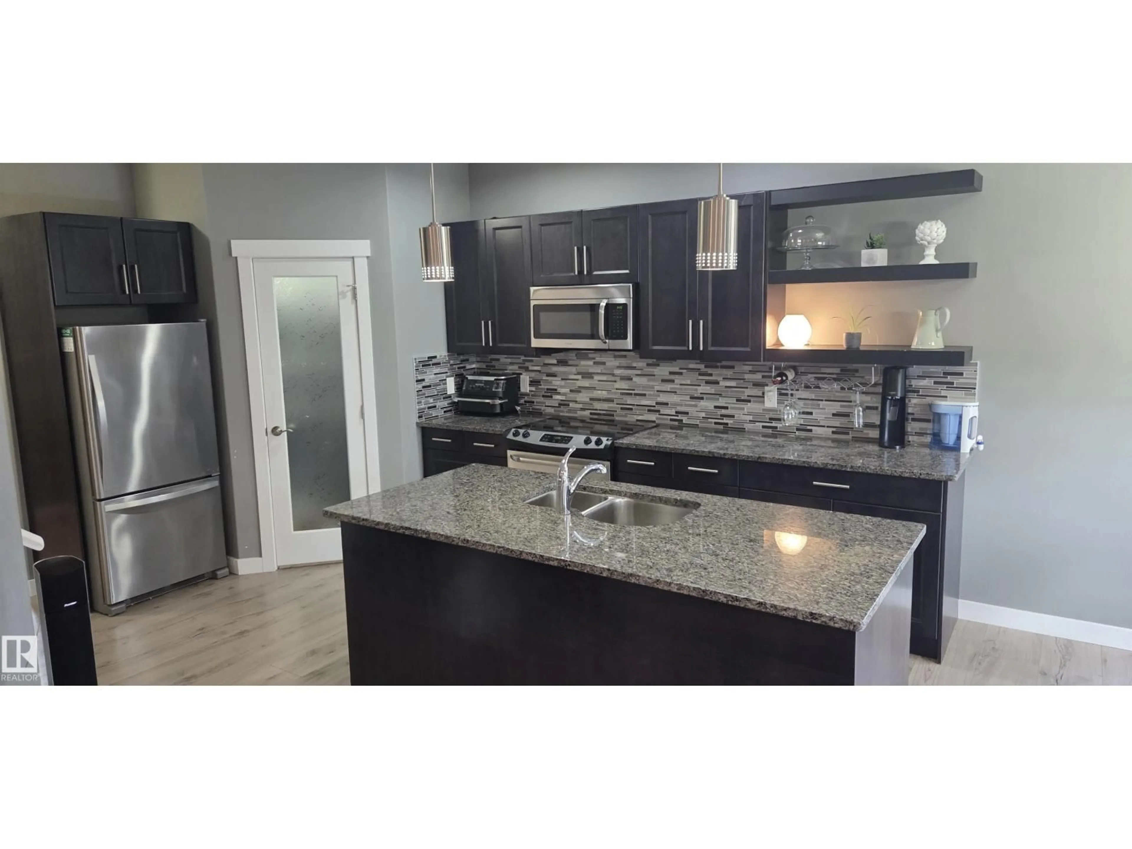 Open concept kitchen, ceramic/tile floor for NW - 16505 133 ST, Edmonton Alberta T6V0J6