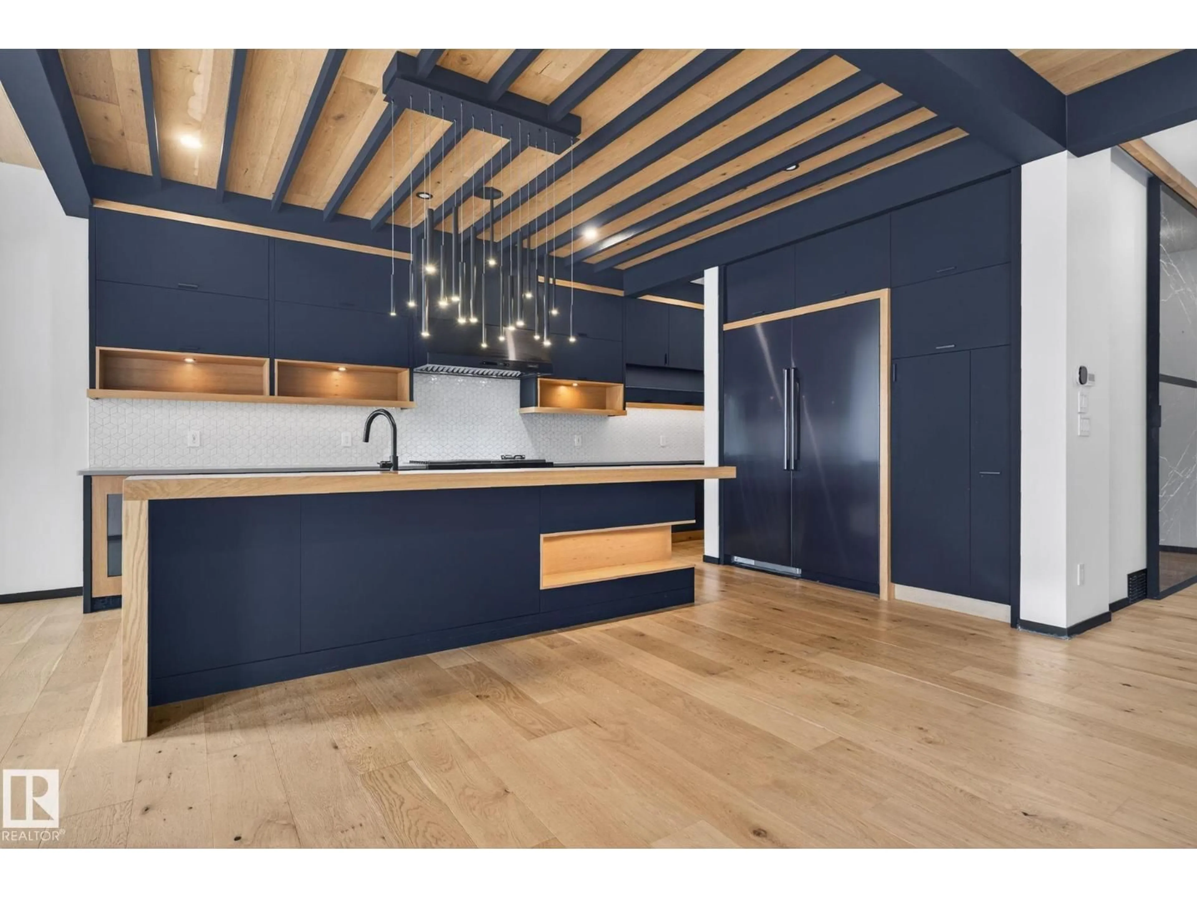 Open concept kitchen, wood/laminate floor for 104 EDGEWATER CI, Leduc Alberta T9E1K5
