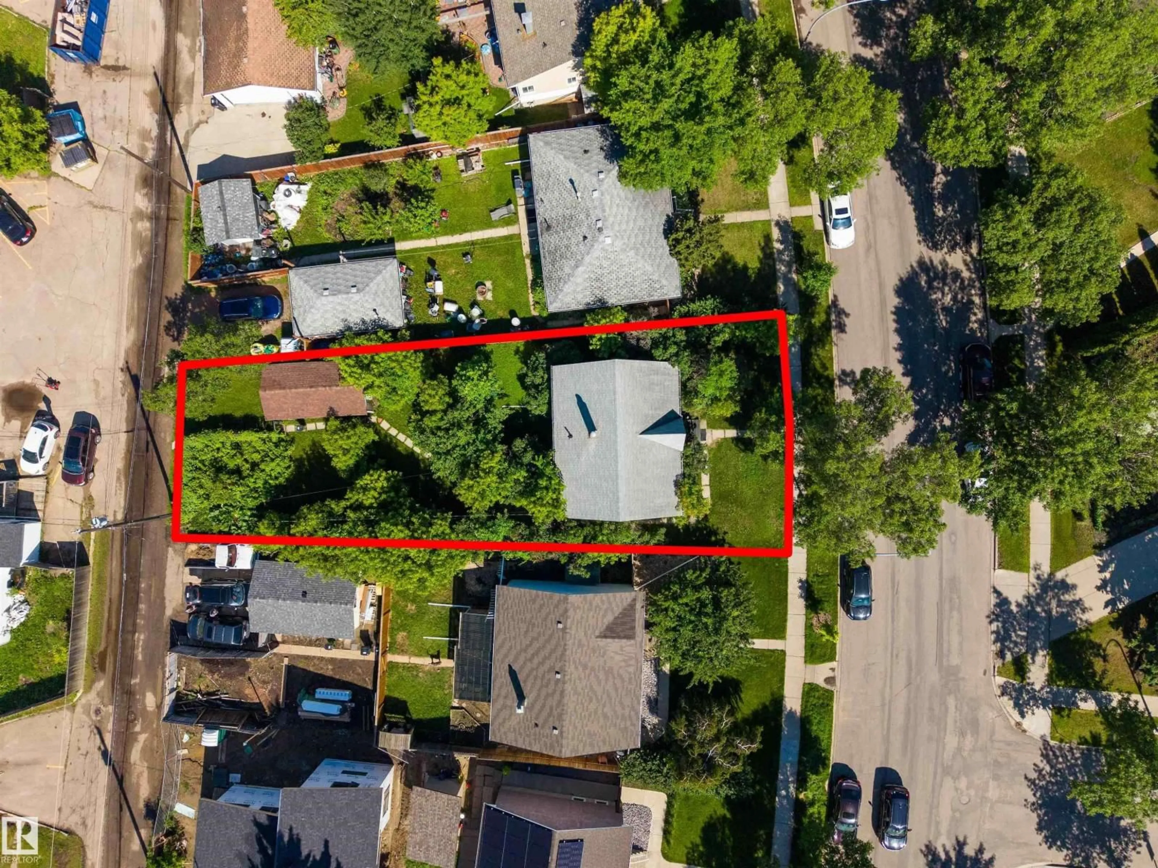 A pic from outside/outdoor area/front of a property/back of a property/a pic from drone, street for 12943 SHERBROOKE AV, Edmonton Alberta T5L4E6