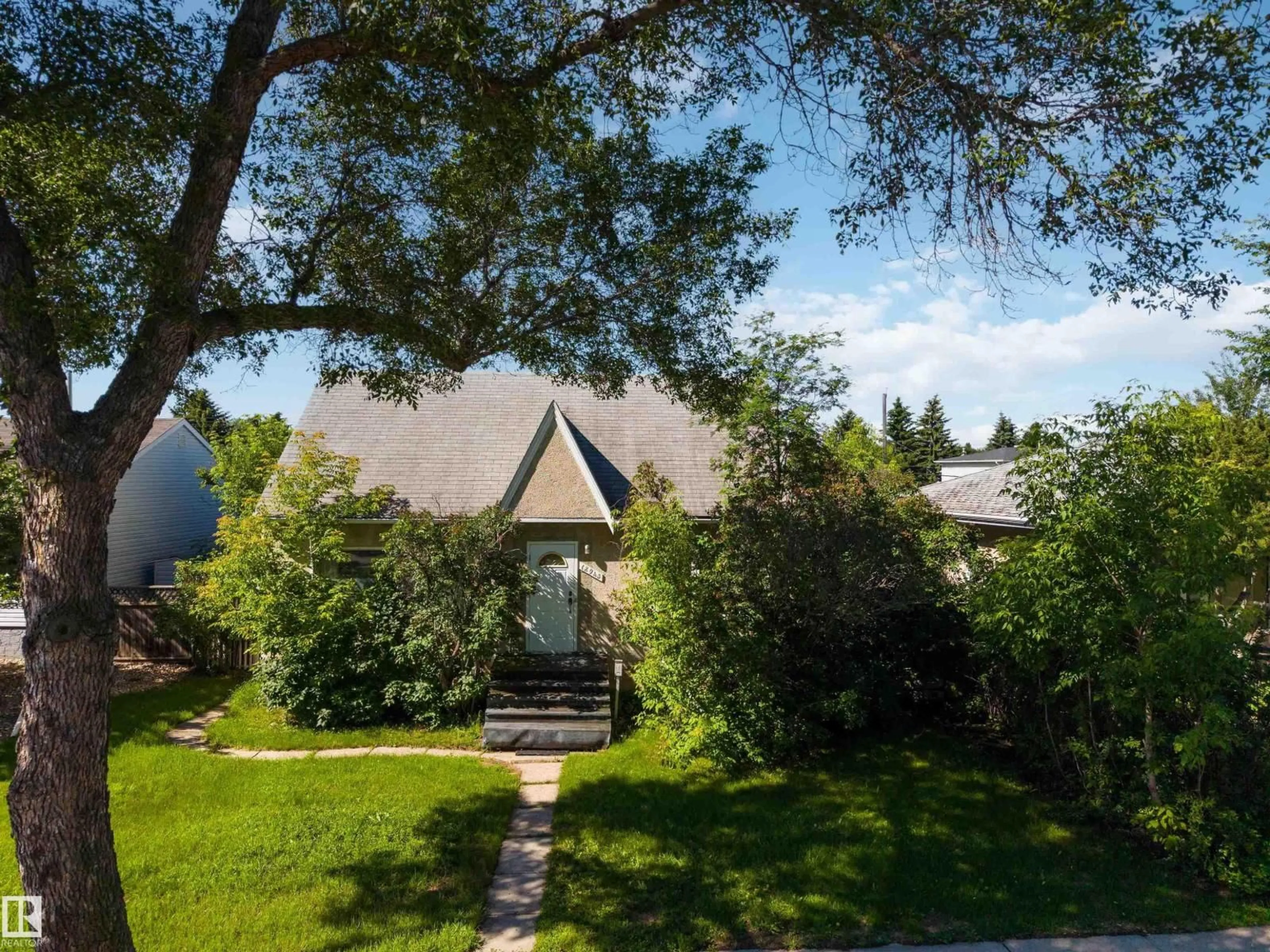 A pic from outside/outdoor area/front of a property/back of a property/a pic from drone, street for 12943 SHERBROOKE AV, Edmonton Alberta T5L4E6
