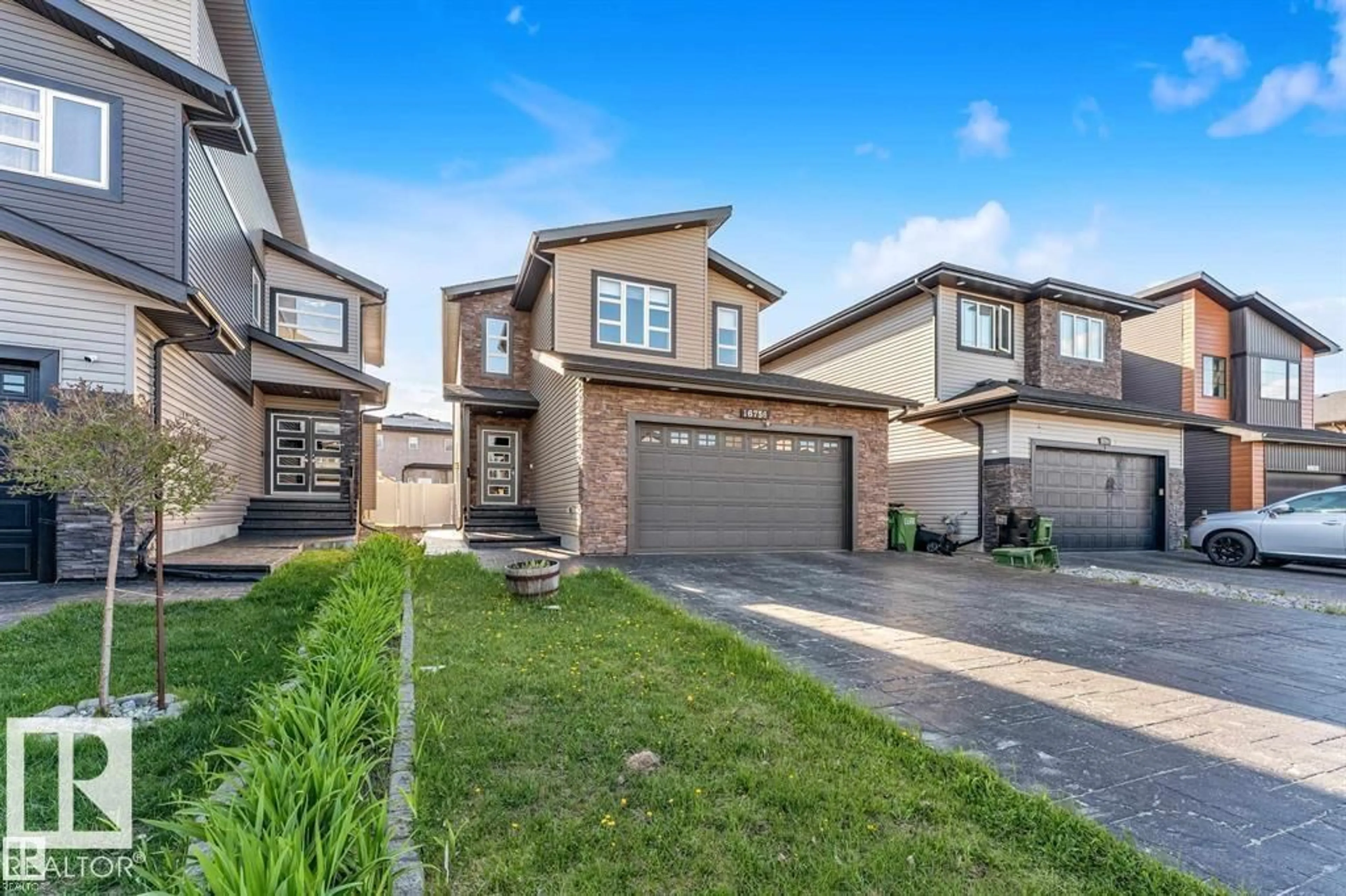 Home with brick exterior material, street for 16756 60 ST, Edmonton Alberta T5Y0W5