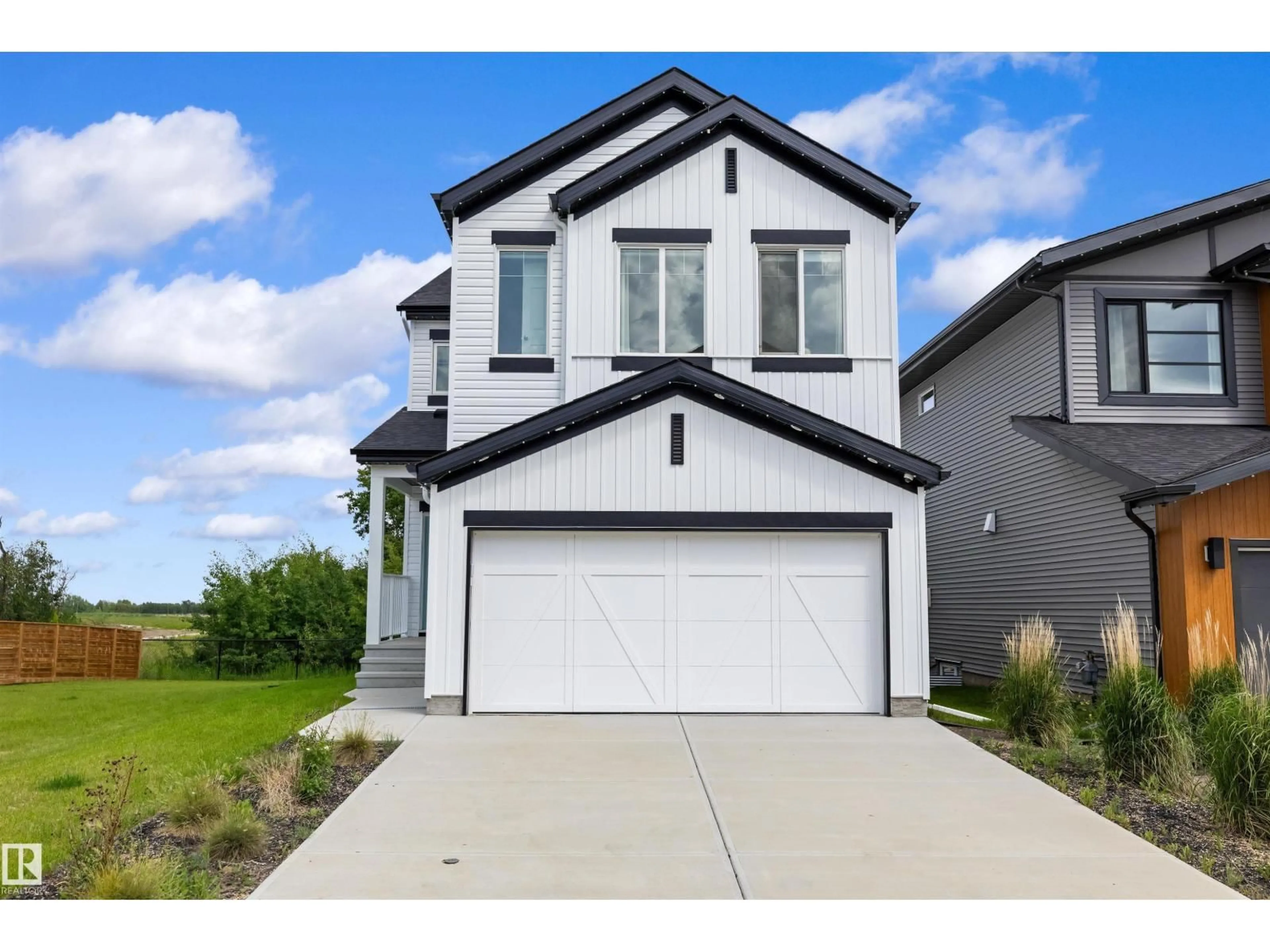 Home with vinyl exterior material, street for 17431 7 ST, Edmonton Alberta T5Y4E7