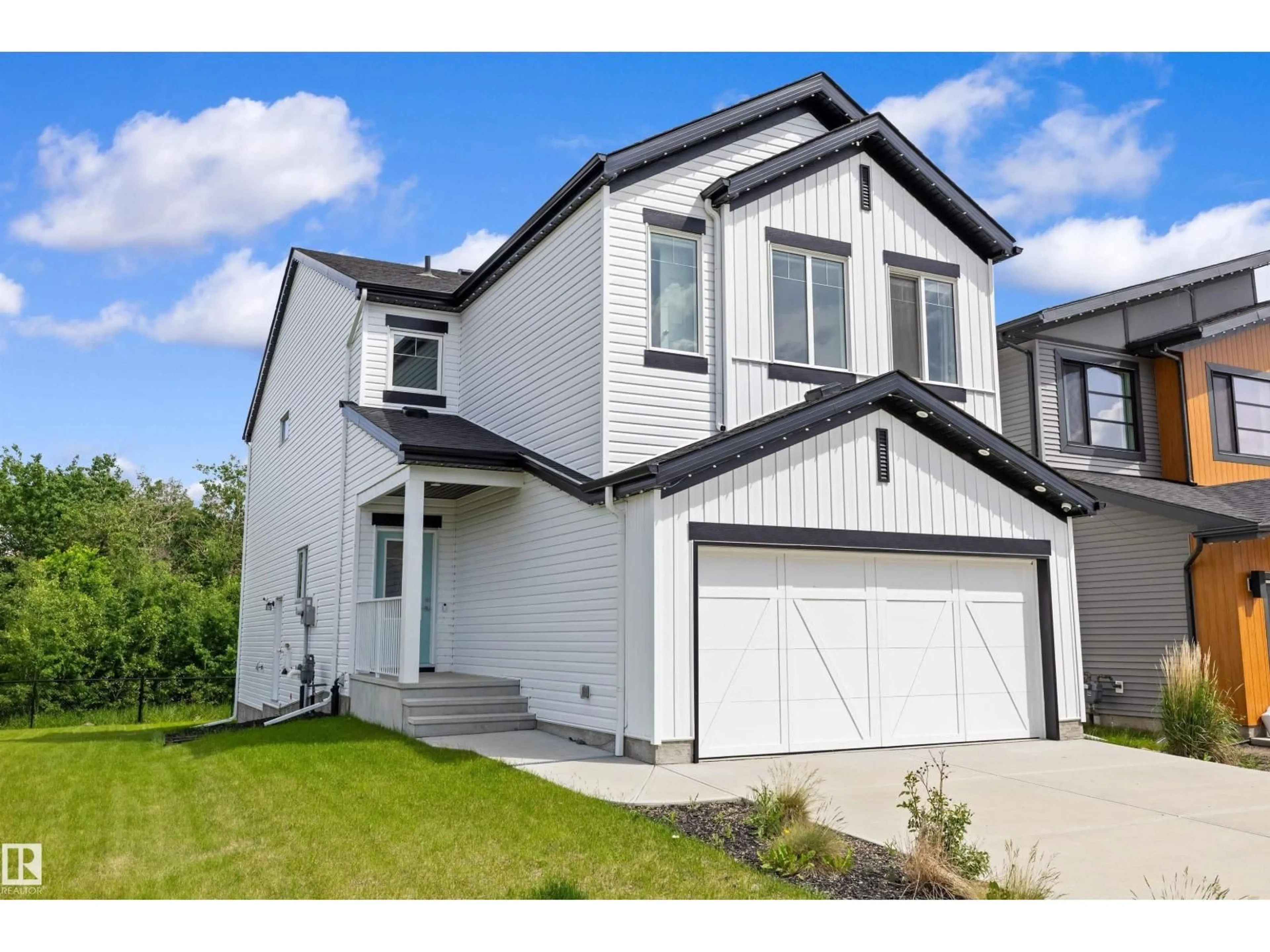 Home with vinyl exterior material, street for 17431 7 ST, Edmonton Alberta T5Y4E7