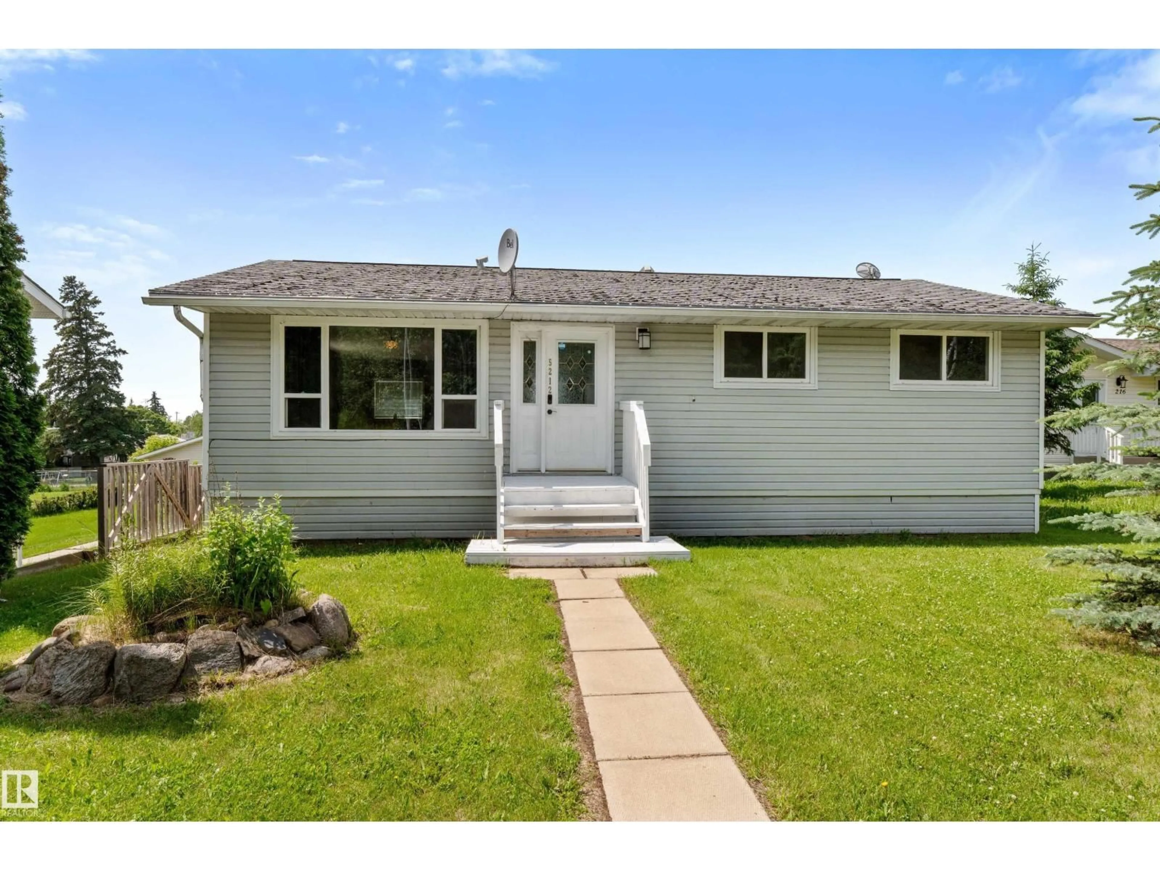 Home with vinyl exterior material, street for 5212 46 ST, Wabamun Alberta T0E2K0