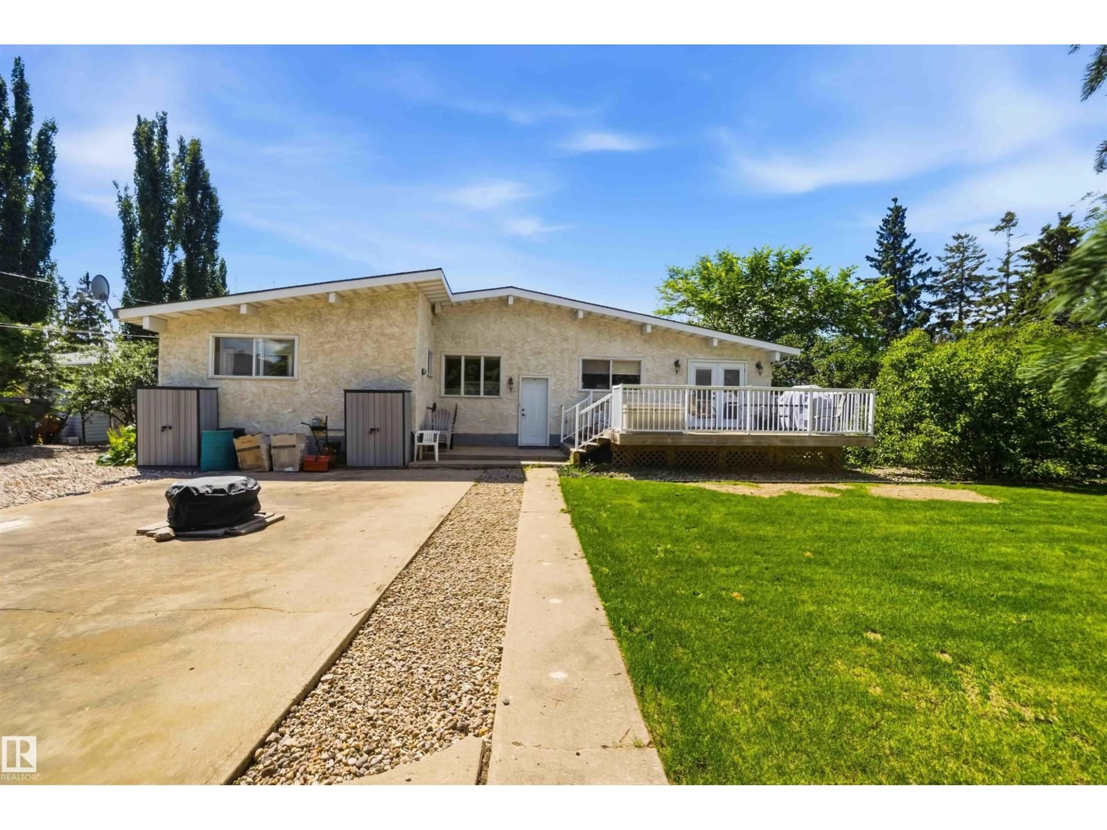 Home with vinyl exterior material, street for NW - 13121 122 ST, Edmonton Alberta T5L0G2