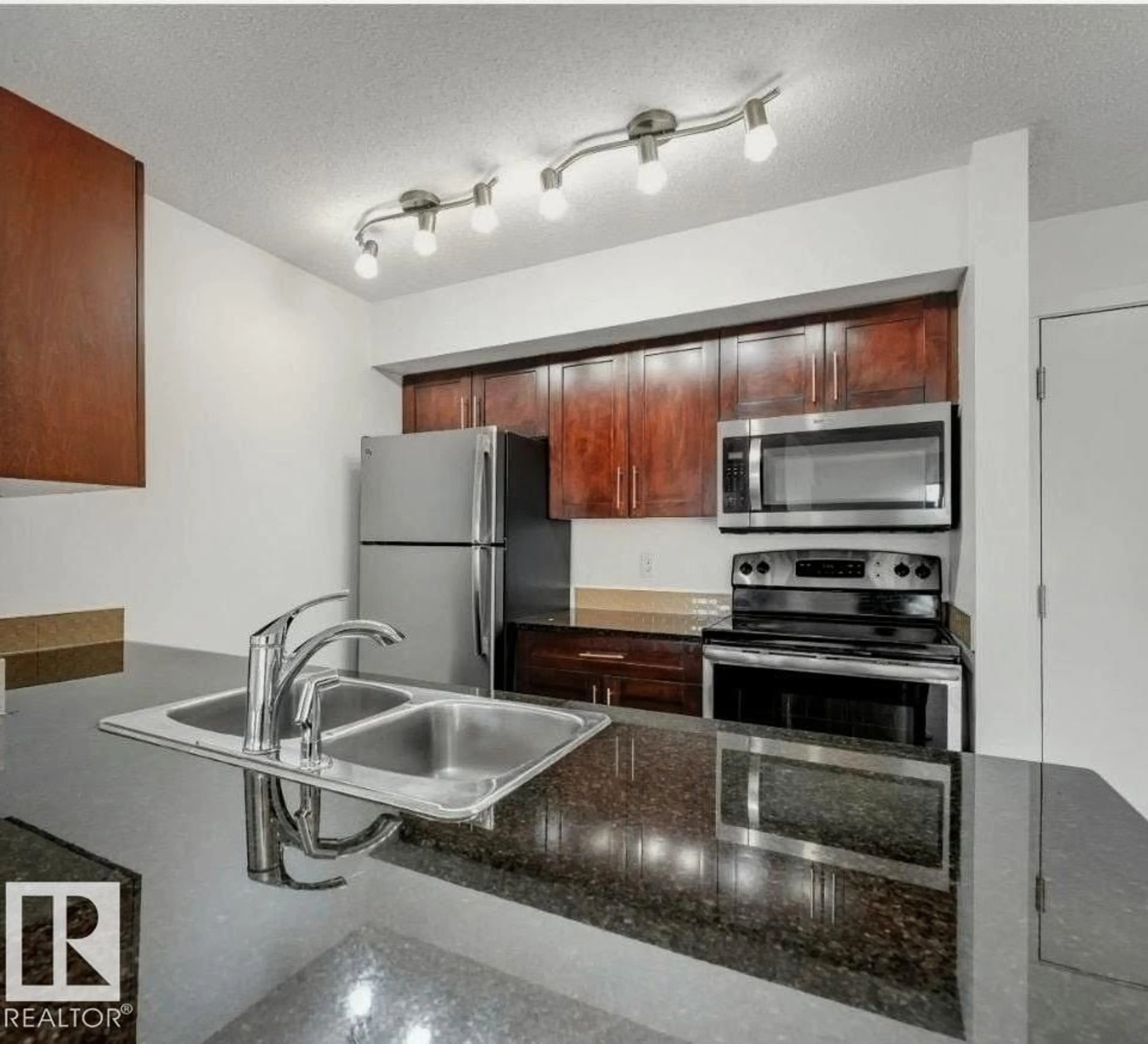 Standard kitchen, unknown for #211 - 3207 JAMES MOWATT TRAIL SW, Edmonton Alberta T6W3L6
