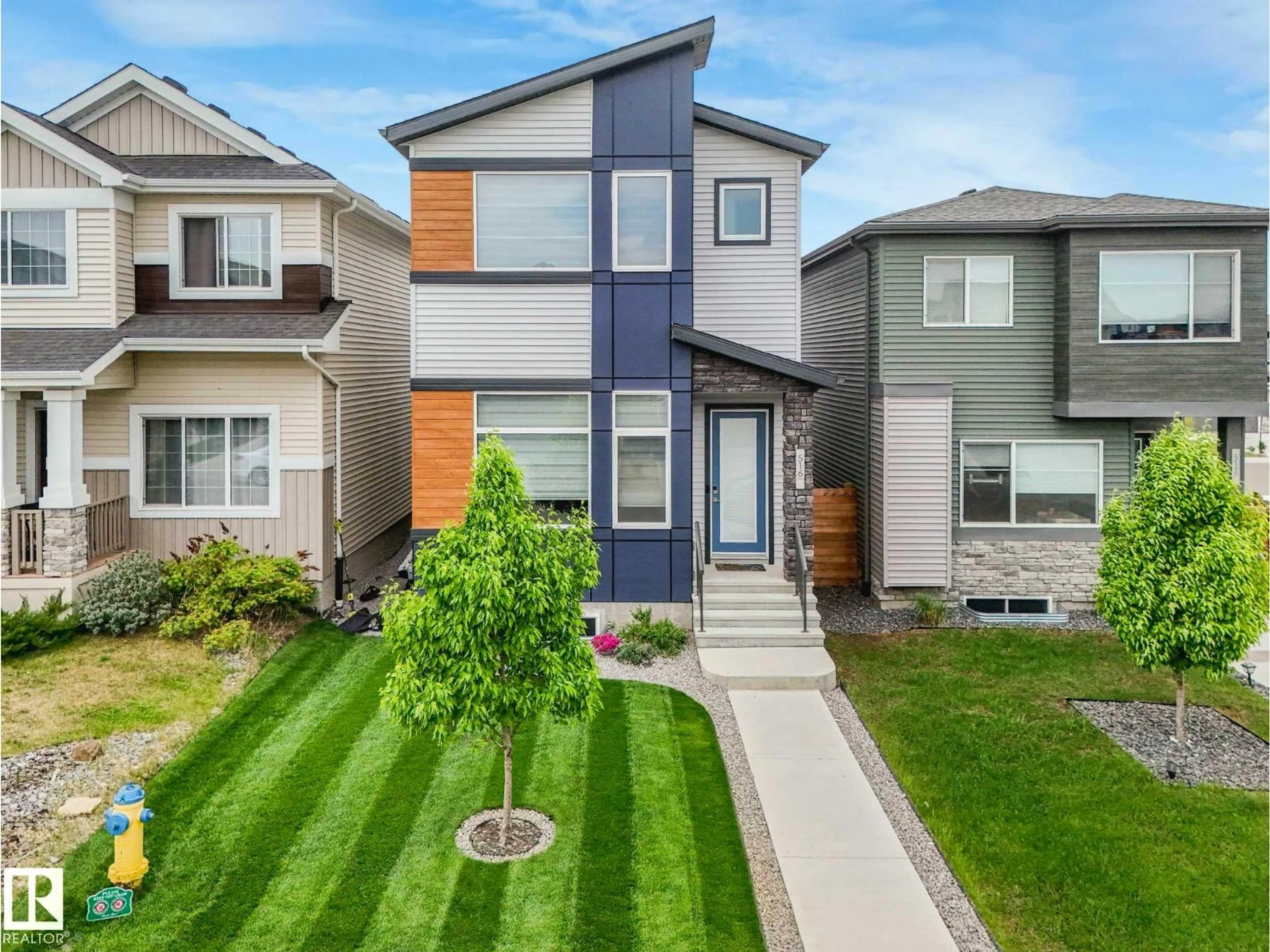 Home with vinyl exterior material, street for 516 35 ST, Edmonton Alberta T6X2W6