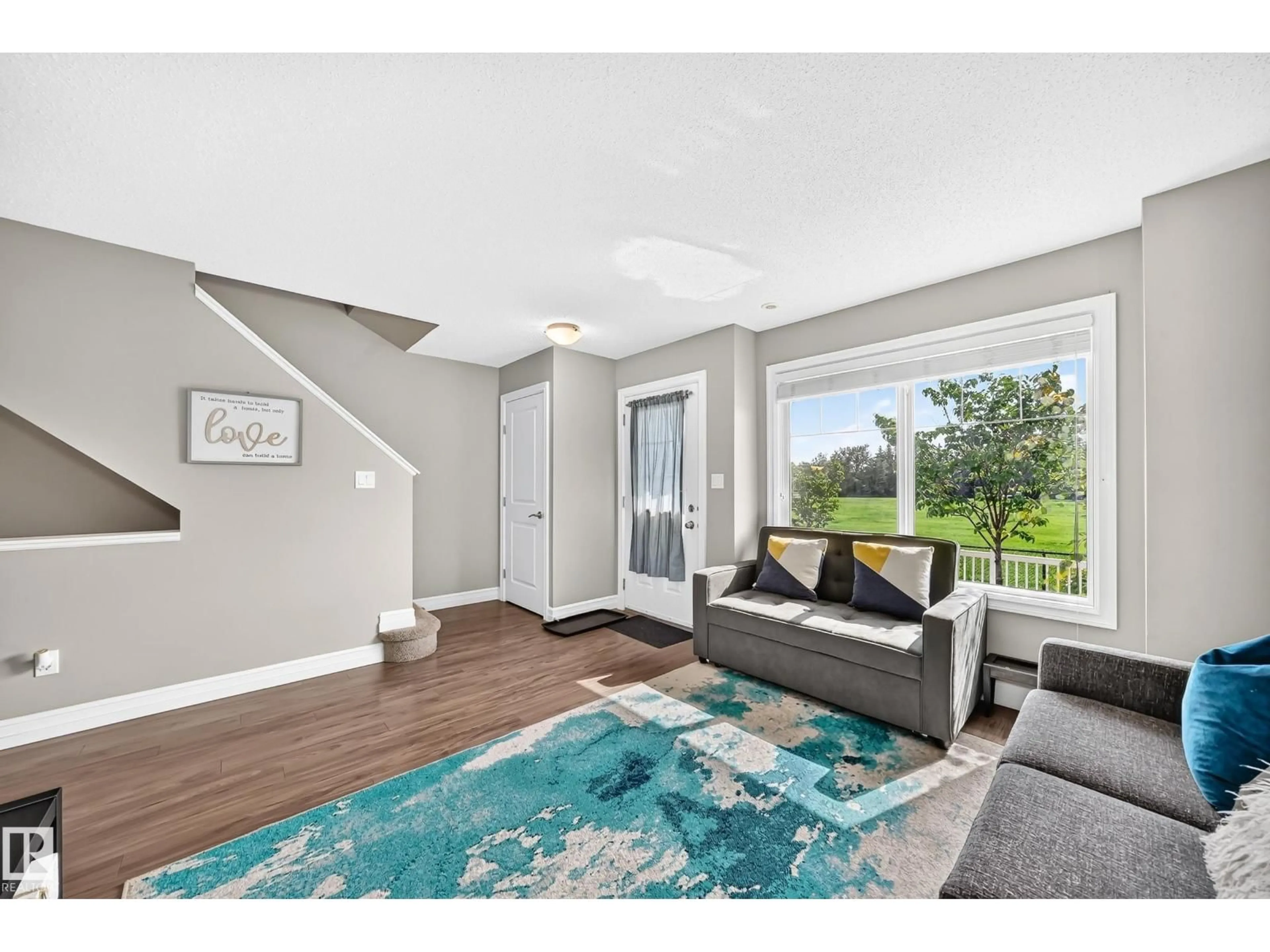 Living room with furniture, unknown for 415 - 10 CLAREVIEW RD, Edmonton Alberta T5A0Z6