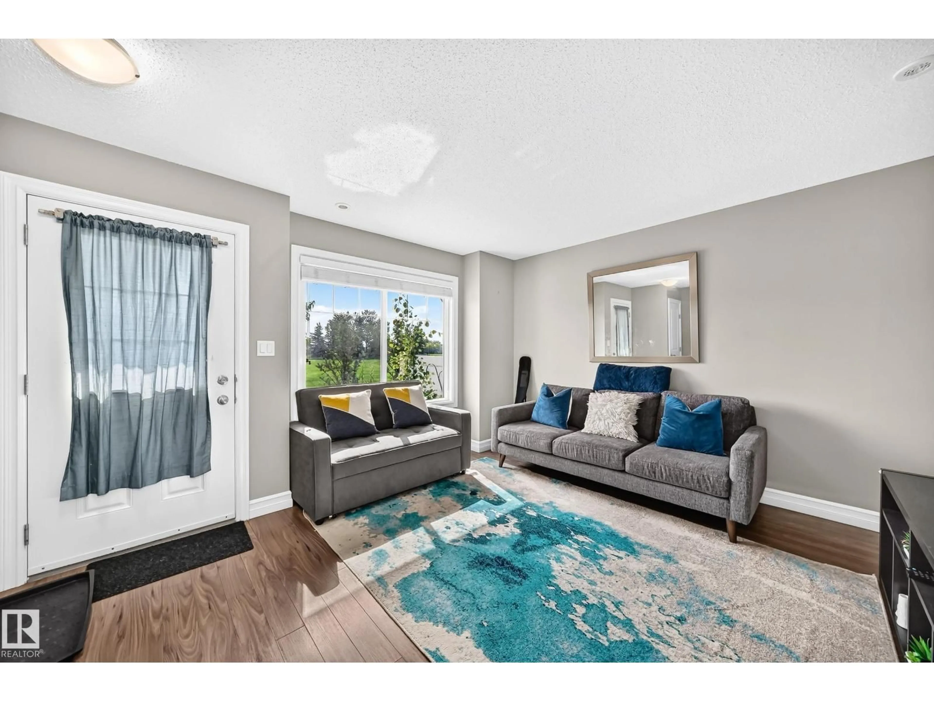 Living room with furniture, unknown for 415 - 10 CLAREVIEW RD, Edmonton Alberta T5A0Z6