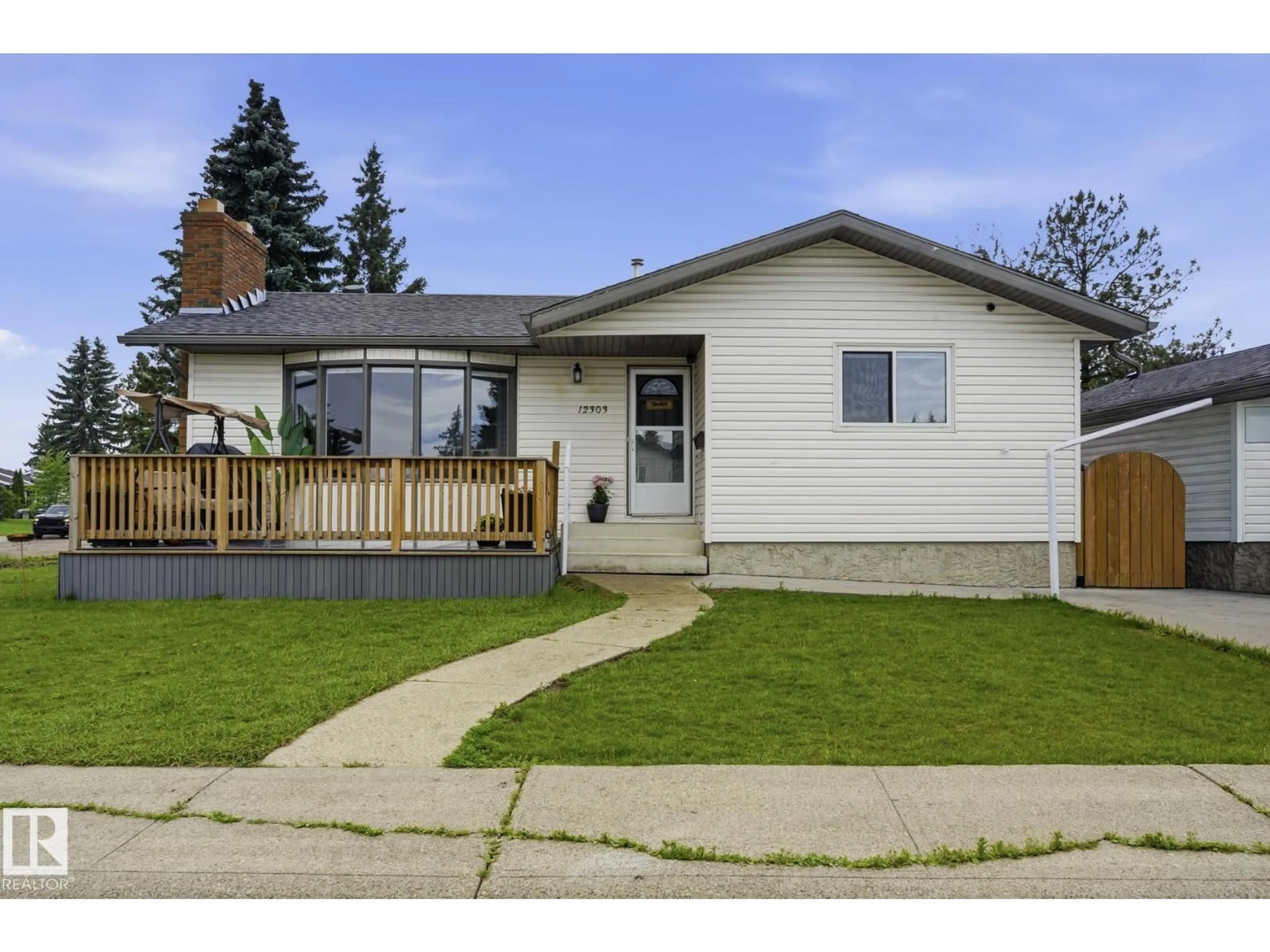 Home with vinyl exterior material, street for NW - 12303 152C AV, Edmonton Alberta T5X1Z1
